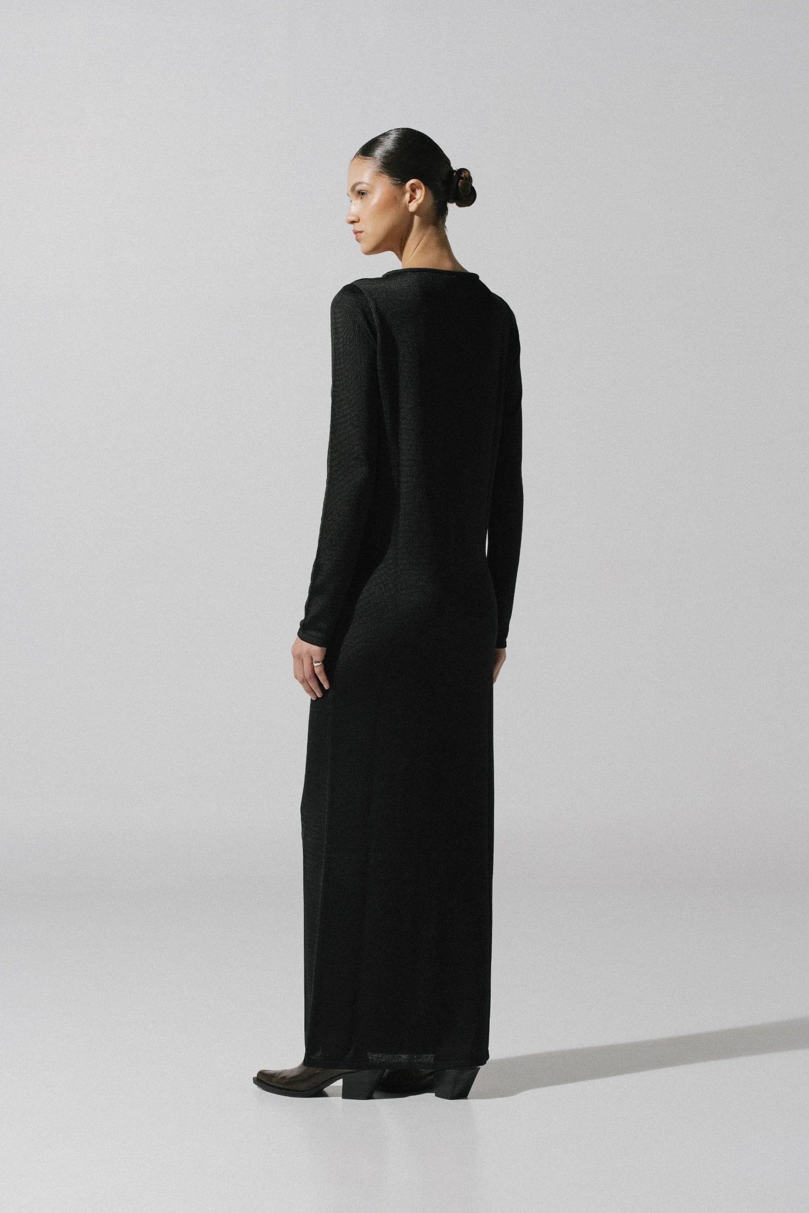 Ramila Dress by Baobab in urban setting, elegant style with Decorative cutouts.