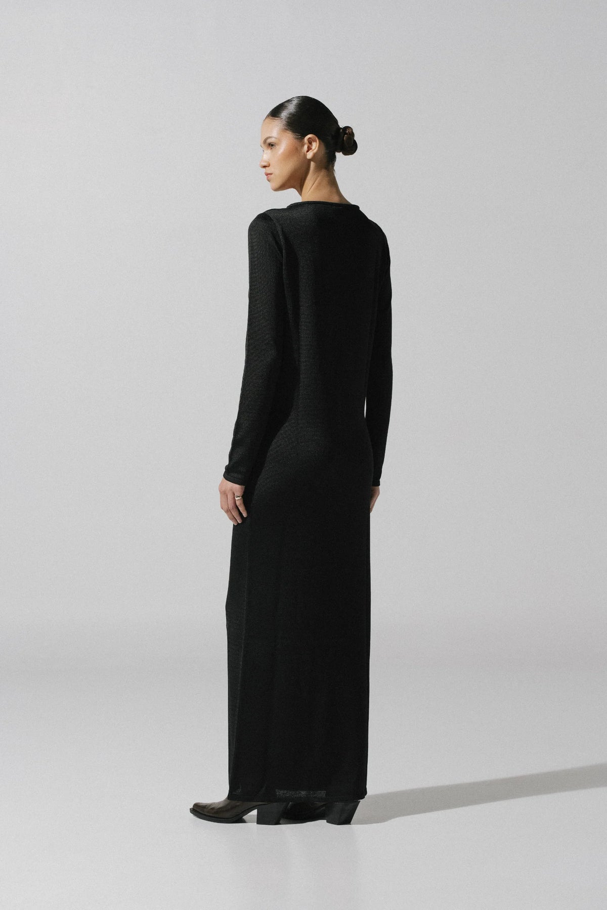 Ramila Dress by Baobab in urban setting, elegant style with Decorative cutouts.