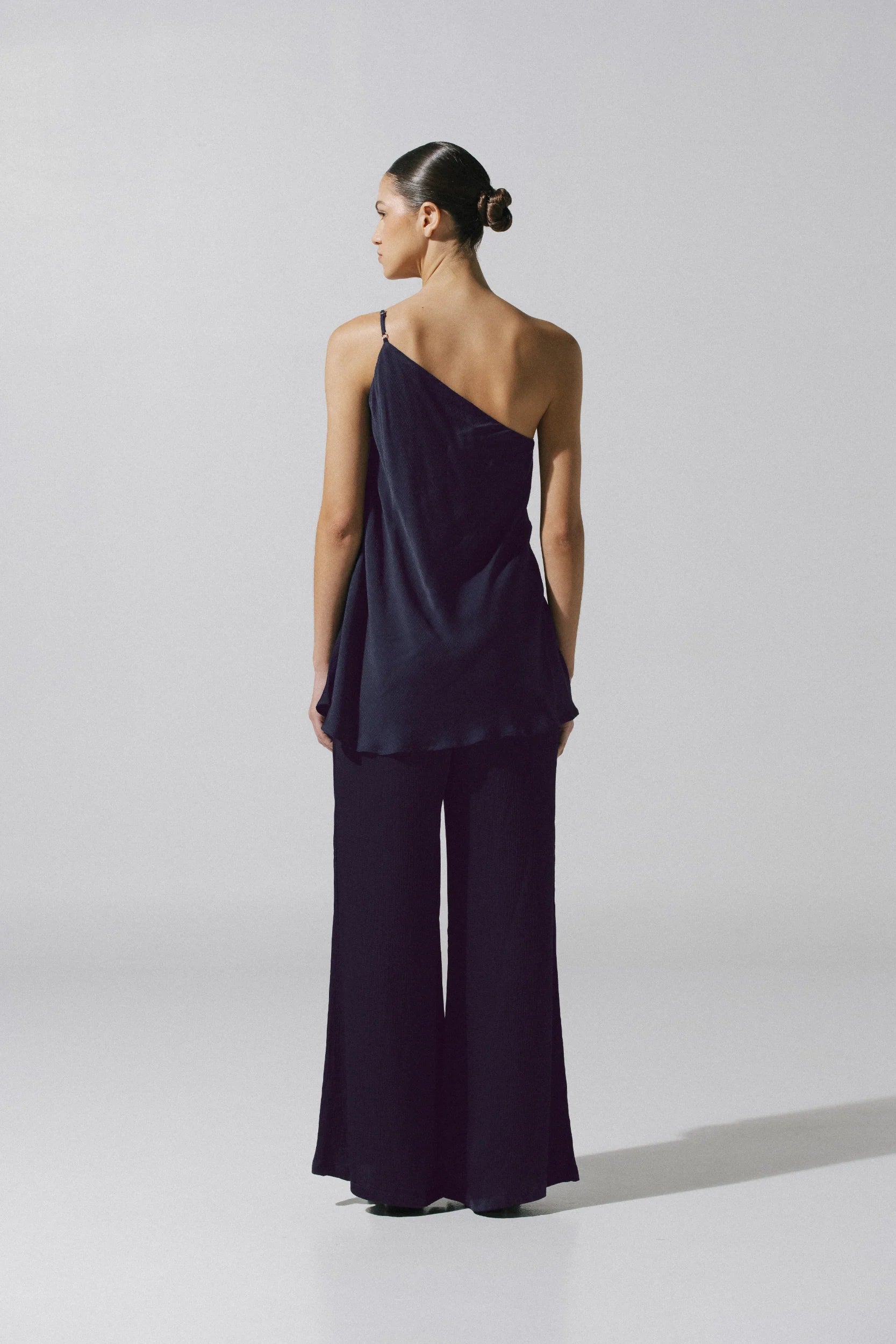 Ferrat Top by Baobab, side view with Embellished detail and asymmetrical neckline.