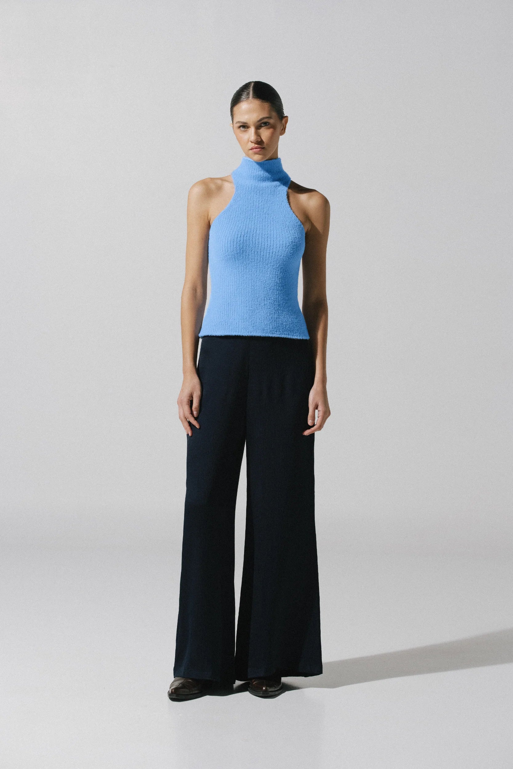 Night blue Lotus Top, side view with Halter Neckline and Stretch fabric.