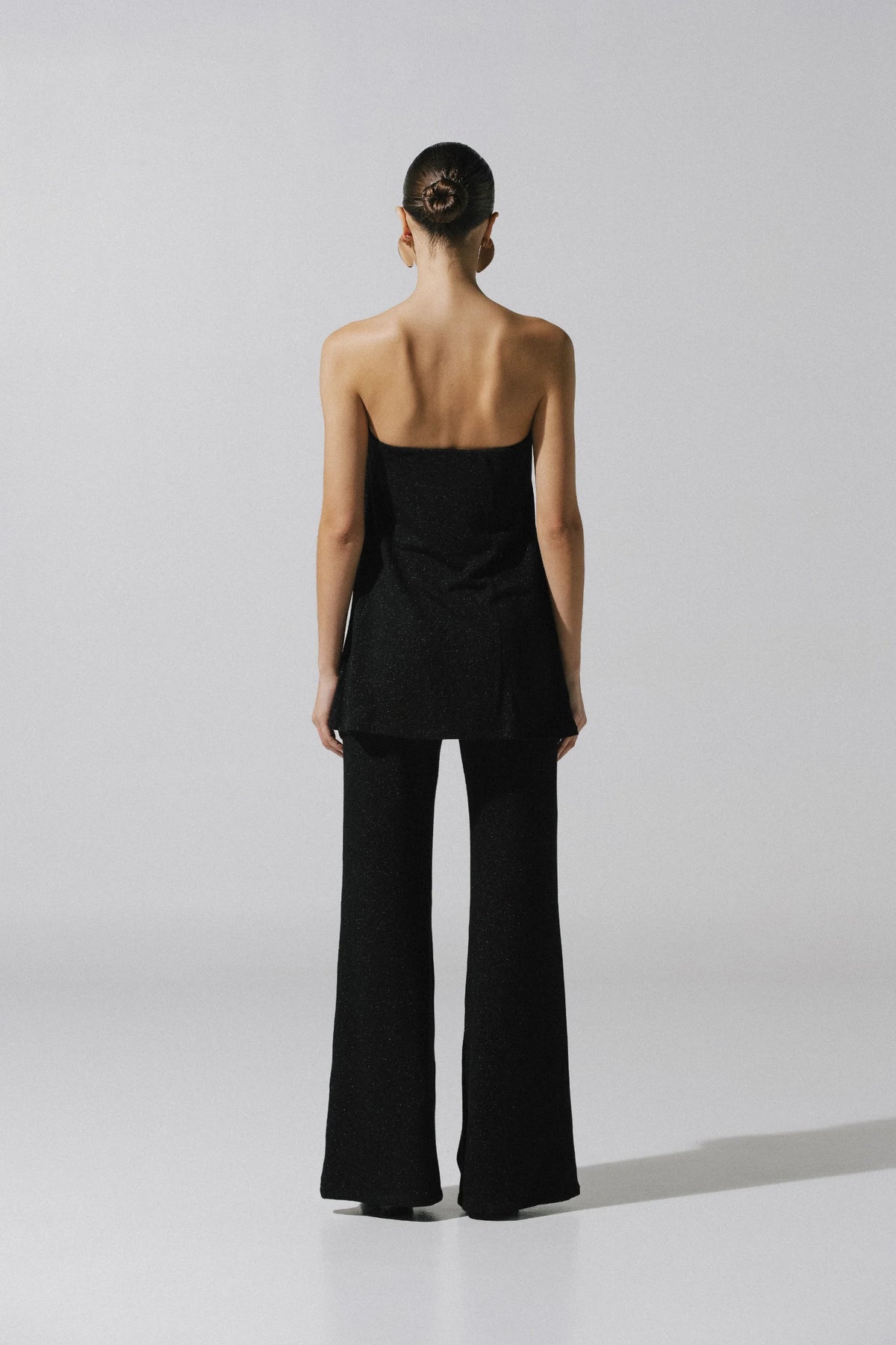 Suzu Pants by Baobab, Wide-leg and fluid black Glossy fabric with Elastic waistband.
