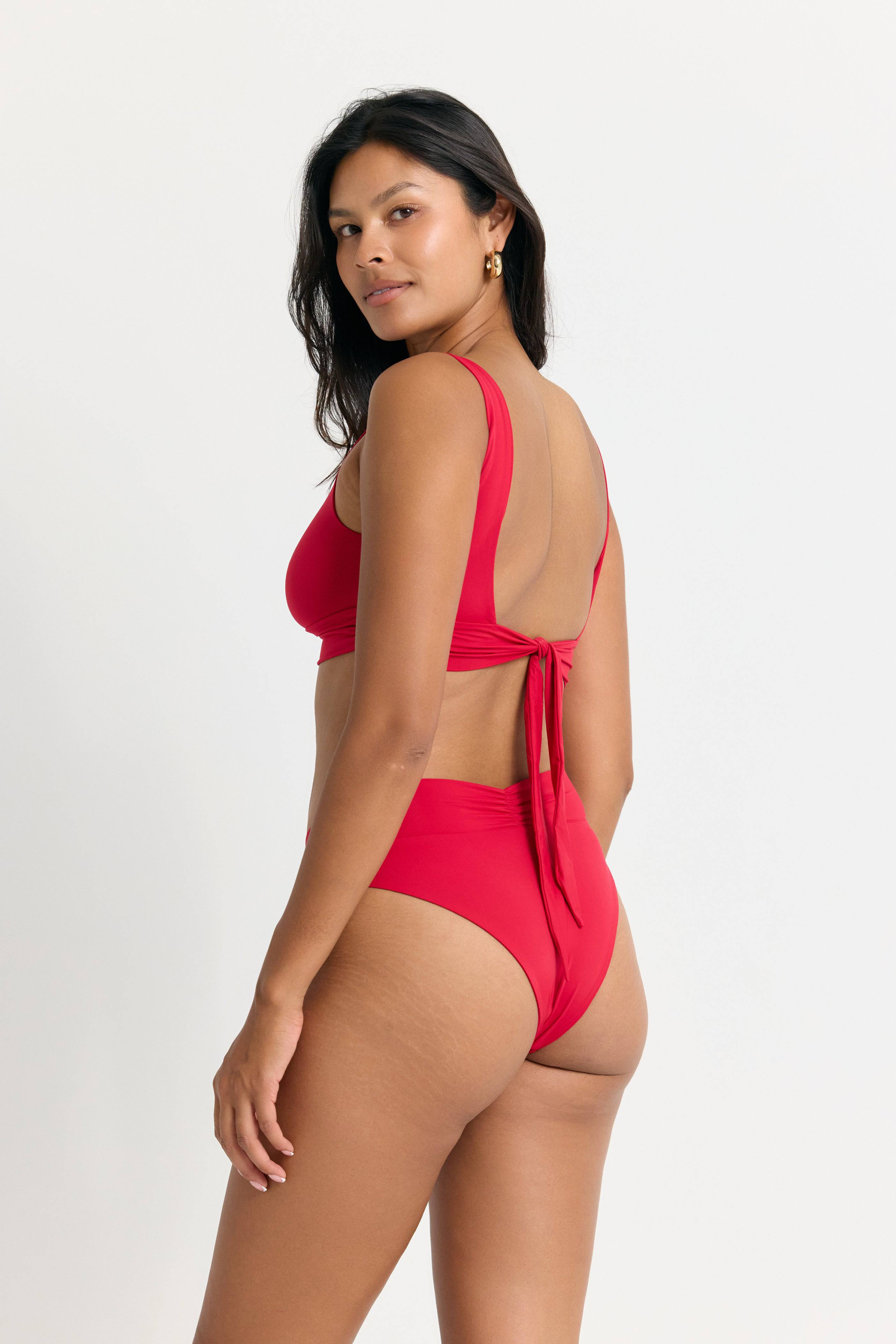 RIOT SWIM Pico high waist bottoms in fire red, featuring a stylish high waist design and vibrant color, perfect for swimwear.