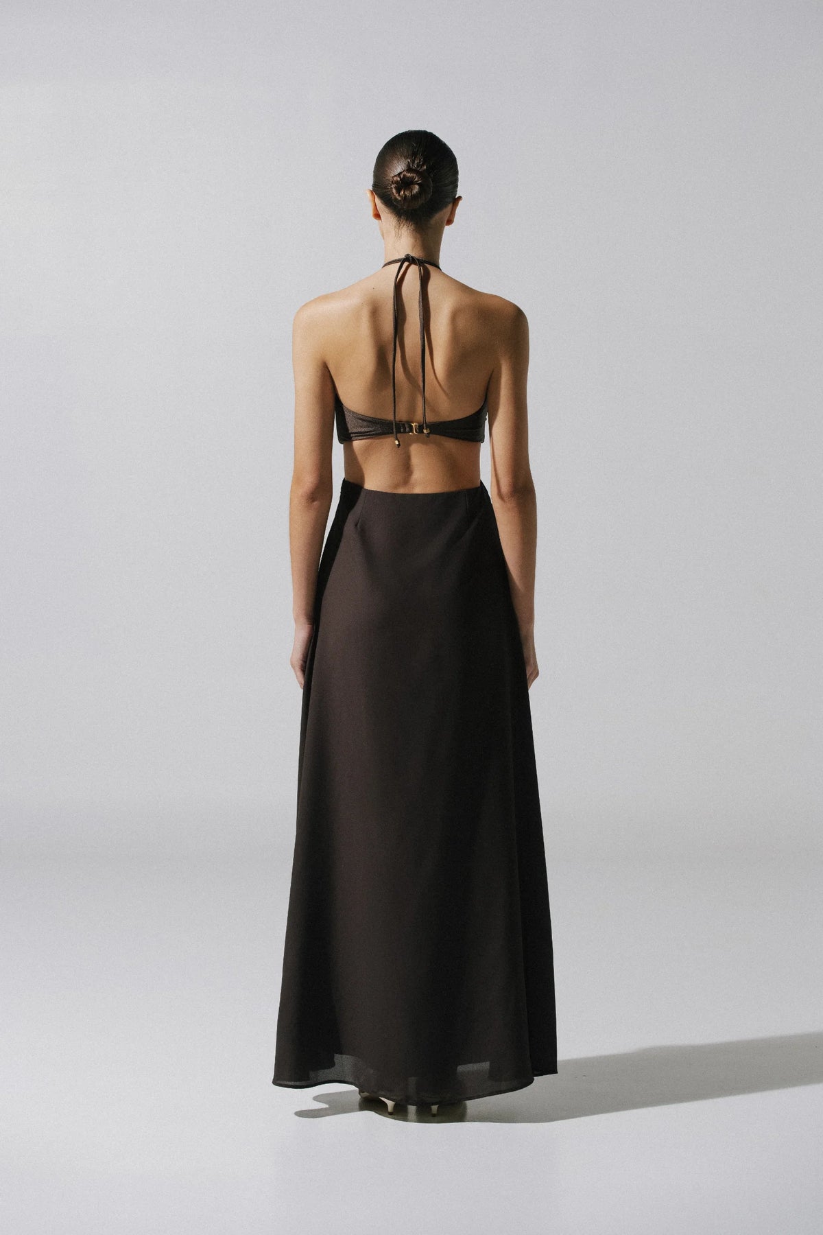 Detail of the Yvon Dress by Baobab, Decorative ring and Ruched neckline.