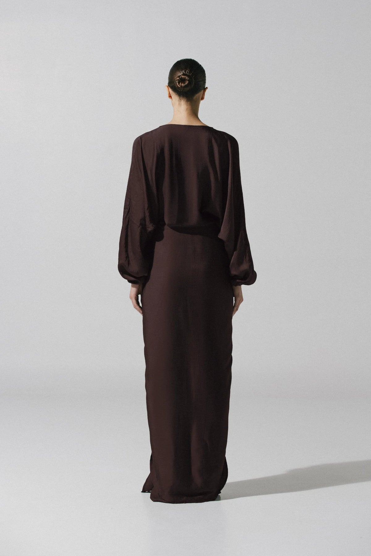 Alexa Dress with V-neckline, Textured fabric and Elastic waistband on cuffs.