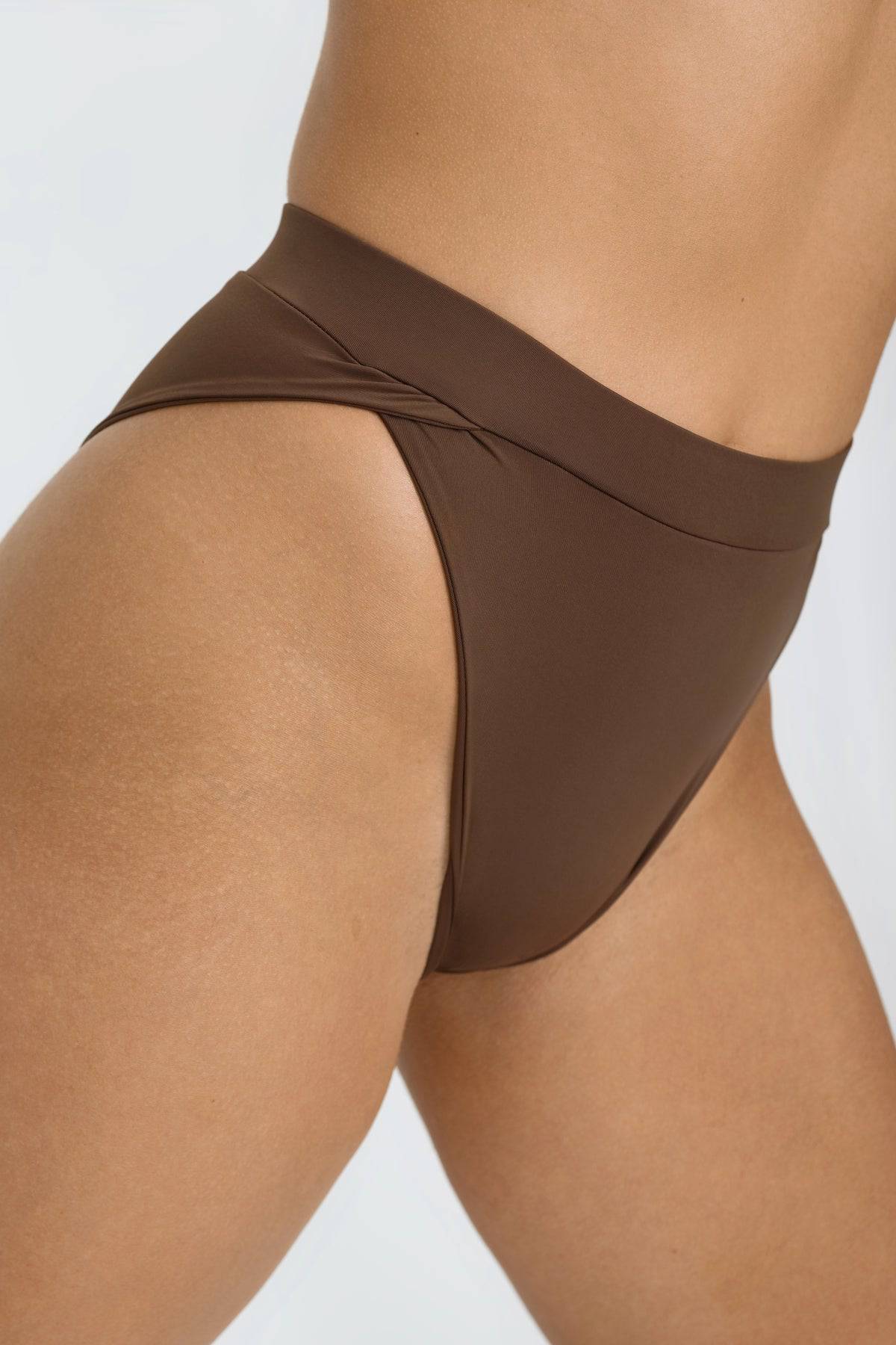 Riot Swim Vista Bottom in chocolate brown high-waisted bikini bottoms with sleek, smooth fabric and minimalistic style.