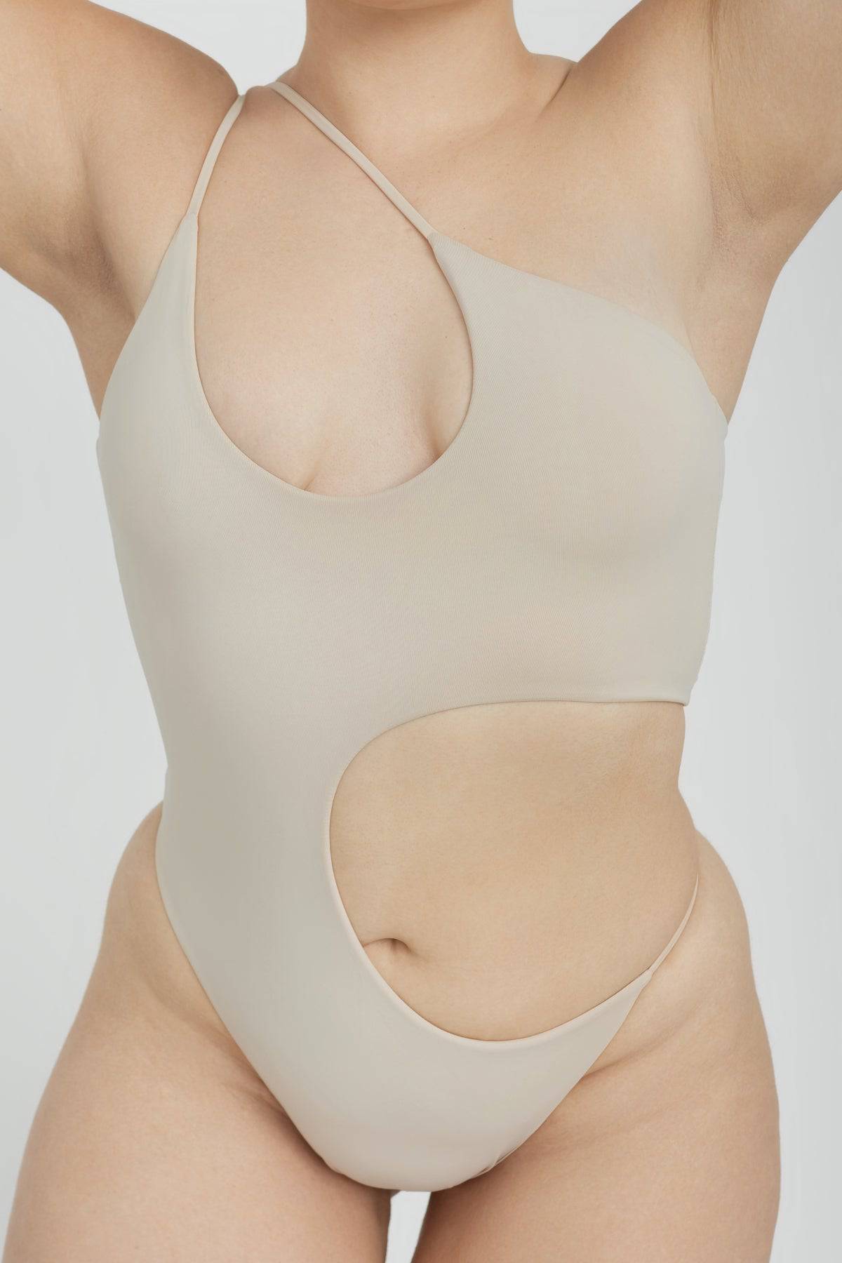 RIOT SWIM Blaise One Piece swimsuit in coconut color, featuring a stylish fit and smooth fabric, perfect for beach or pool.