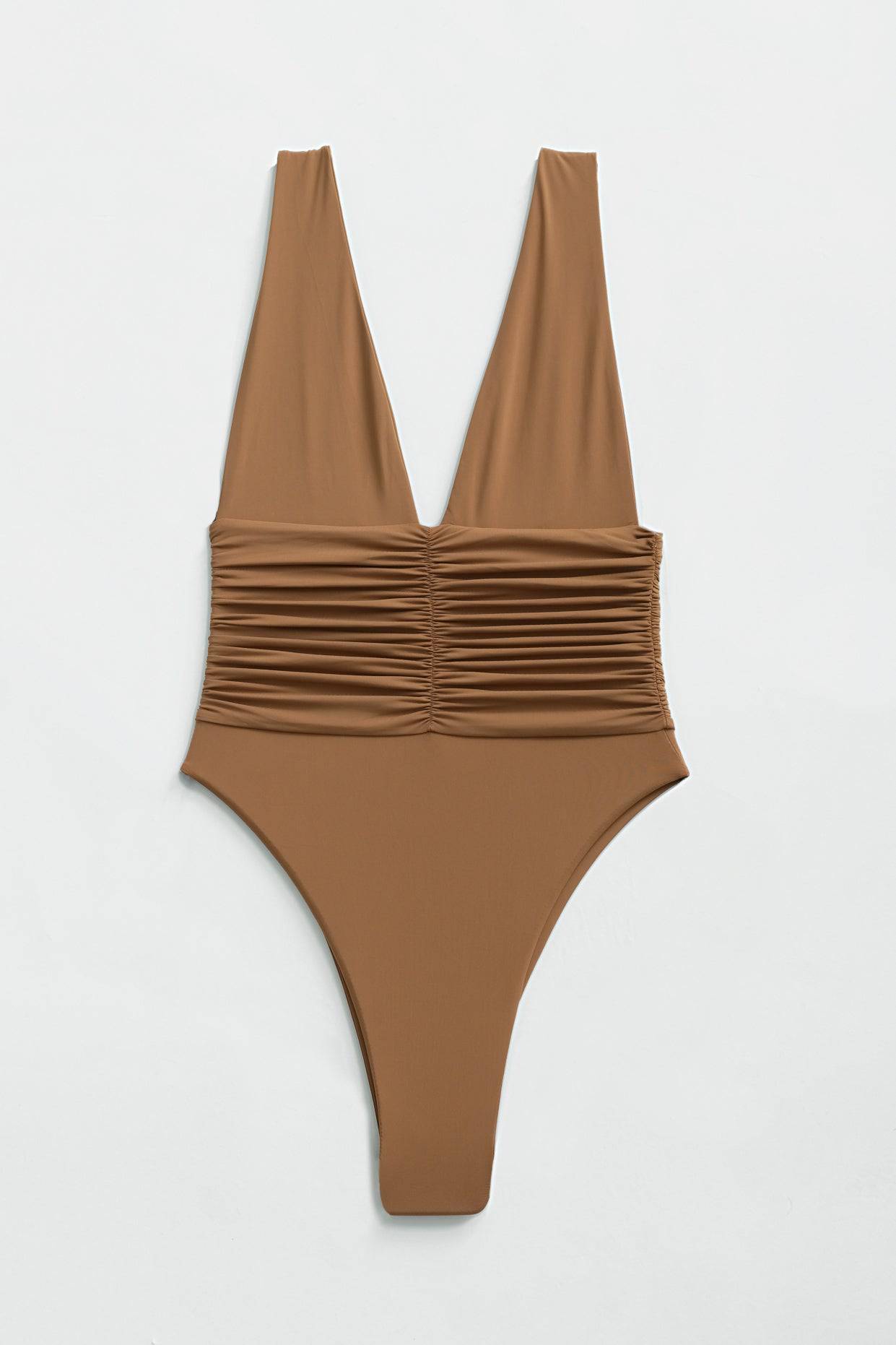 RIOT SWIM Echo One Piece Moderate swimsuit in Brown Sugar, featuring a stylish cut and comfortable fit, displayed on a mannequin.