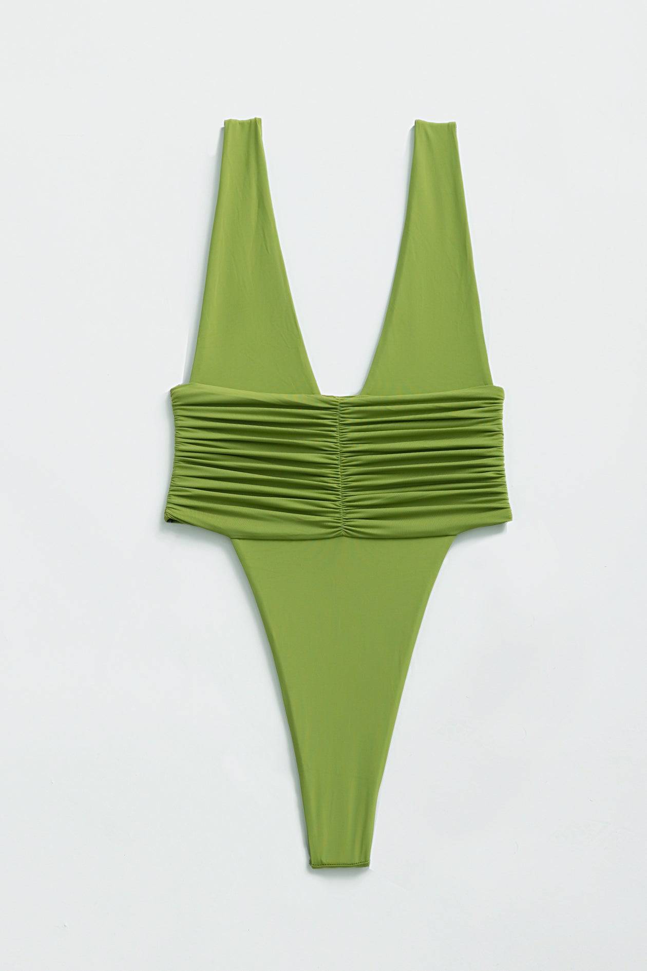 RIOT SWIM Echo One Piece Minimal swimsuit in matcha green, featuring a sleek, simple design with smooth fabric and clean lines.
