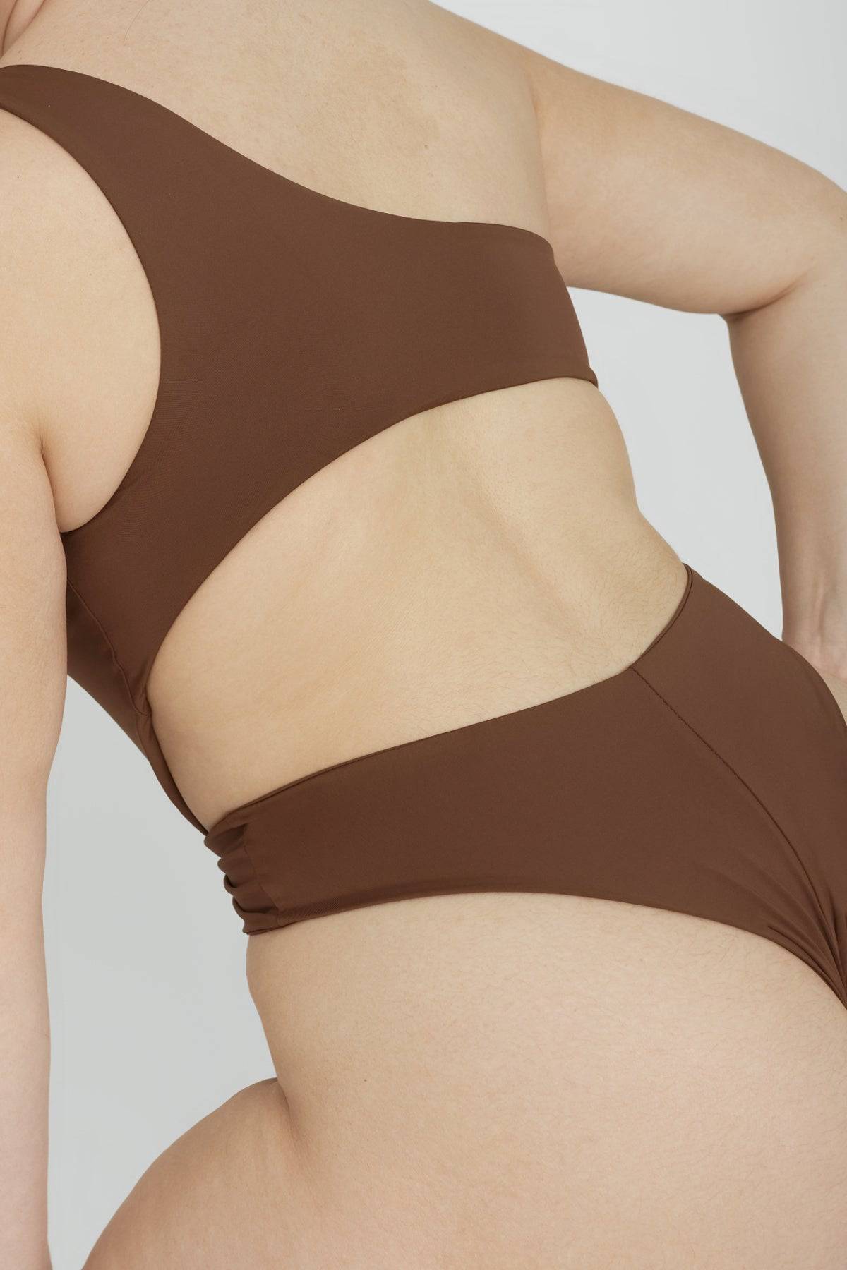 RIOT SWIM Maddox One Piece swimsuit in chocolate color, featuring a stylish design and comfortable fit, perfect for swimming.
