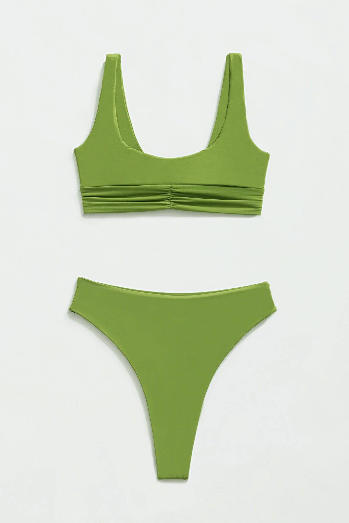 Riot Swim Kai high waist bottoms in matcha green, stylish swimwear with a high-rise fit and seamless design.
