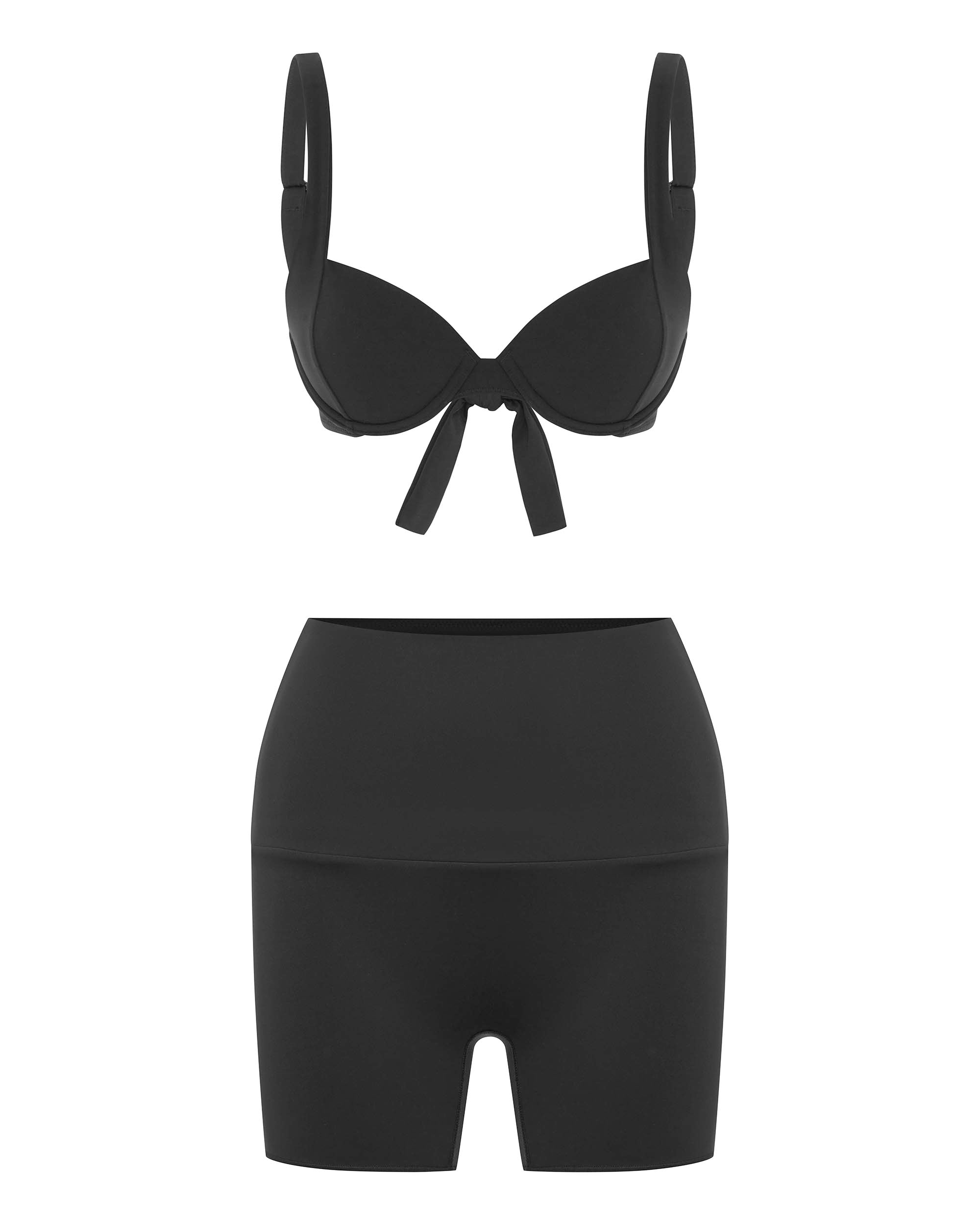 Studio image of the CONTOUR BOOST TOP in BLACK, featuring its bralette shape and adjustable shoulder straps. 