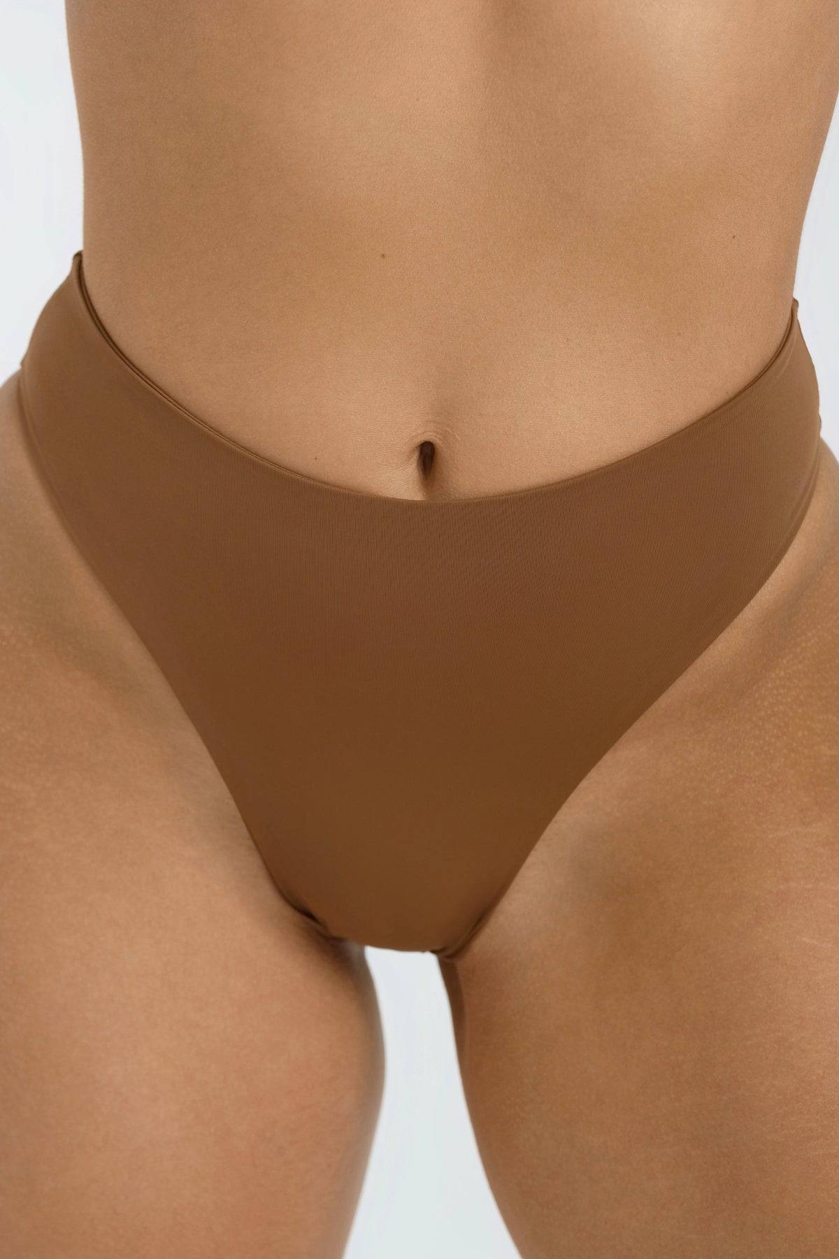 Light brown Riot Swim Willow Bottom bikini bottom with full coverage, designed for comfortable and stylish beachwear.