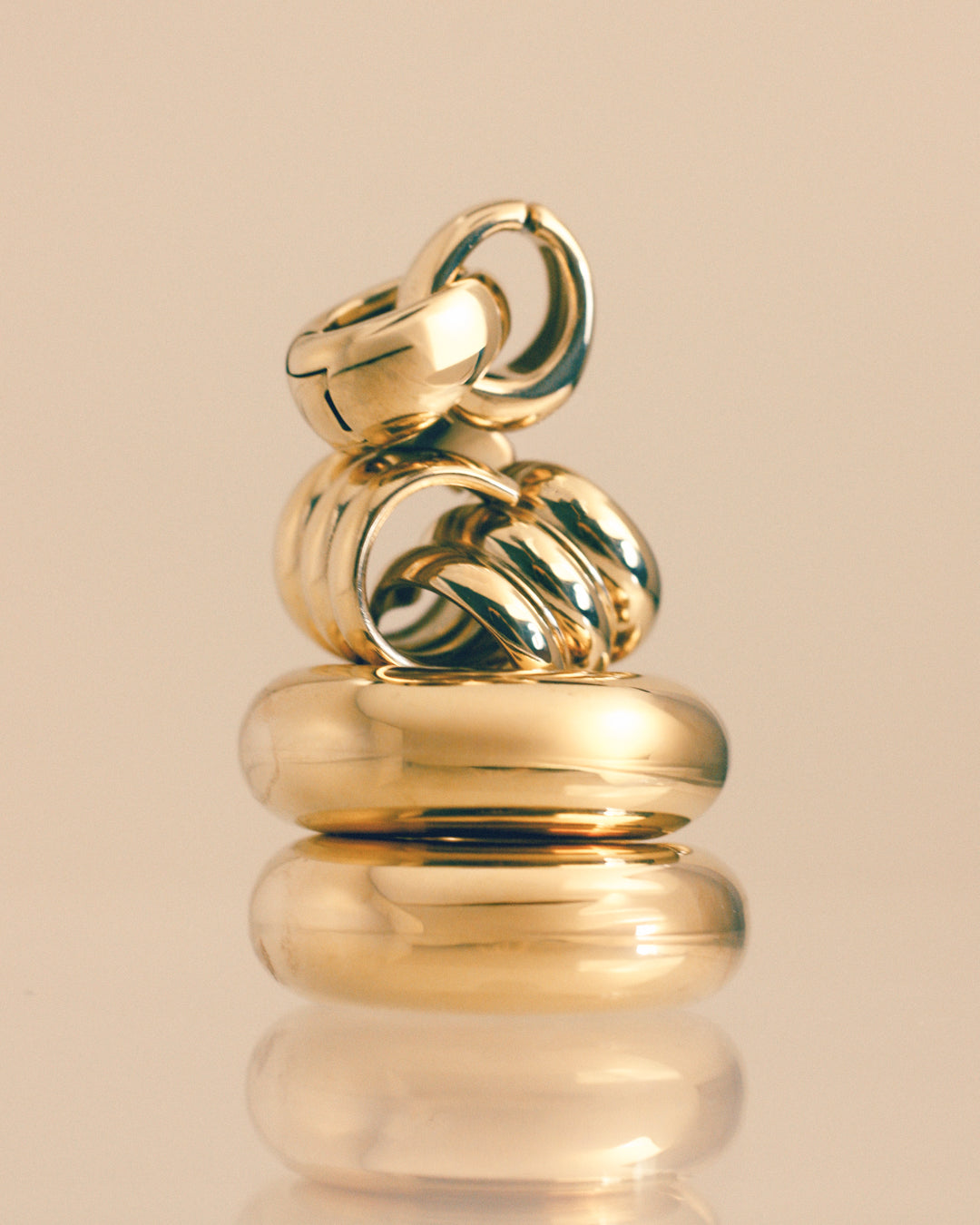 The Luv Aj Marbella Ear Cuff Set, Noemi Ear Cuff Set, and Ridged Positano Ear Cuff Set in Gold