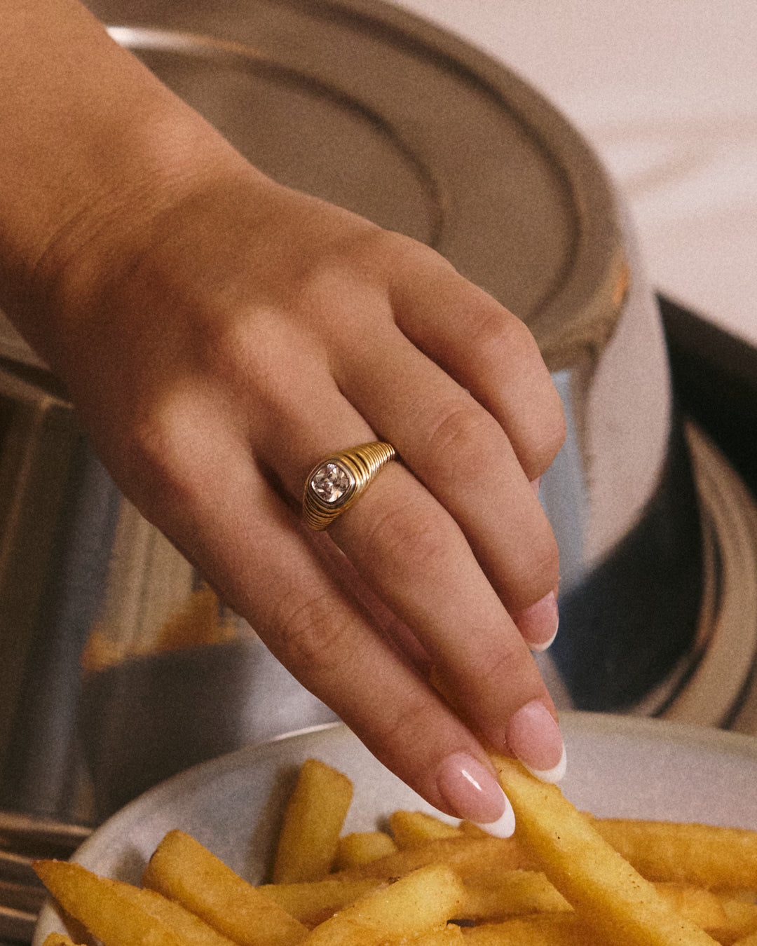 The Luv Aj Georgia Stone Signet Ring in Gold on Models hand