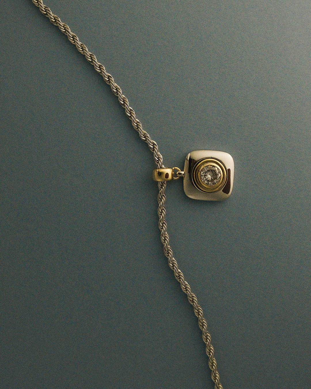 The Luv Aj Luna Bezel Pendant necklace flat lay photo in gold