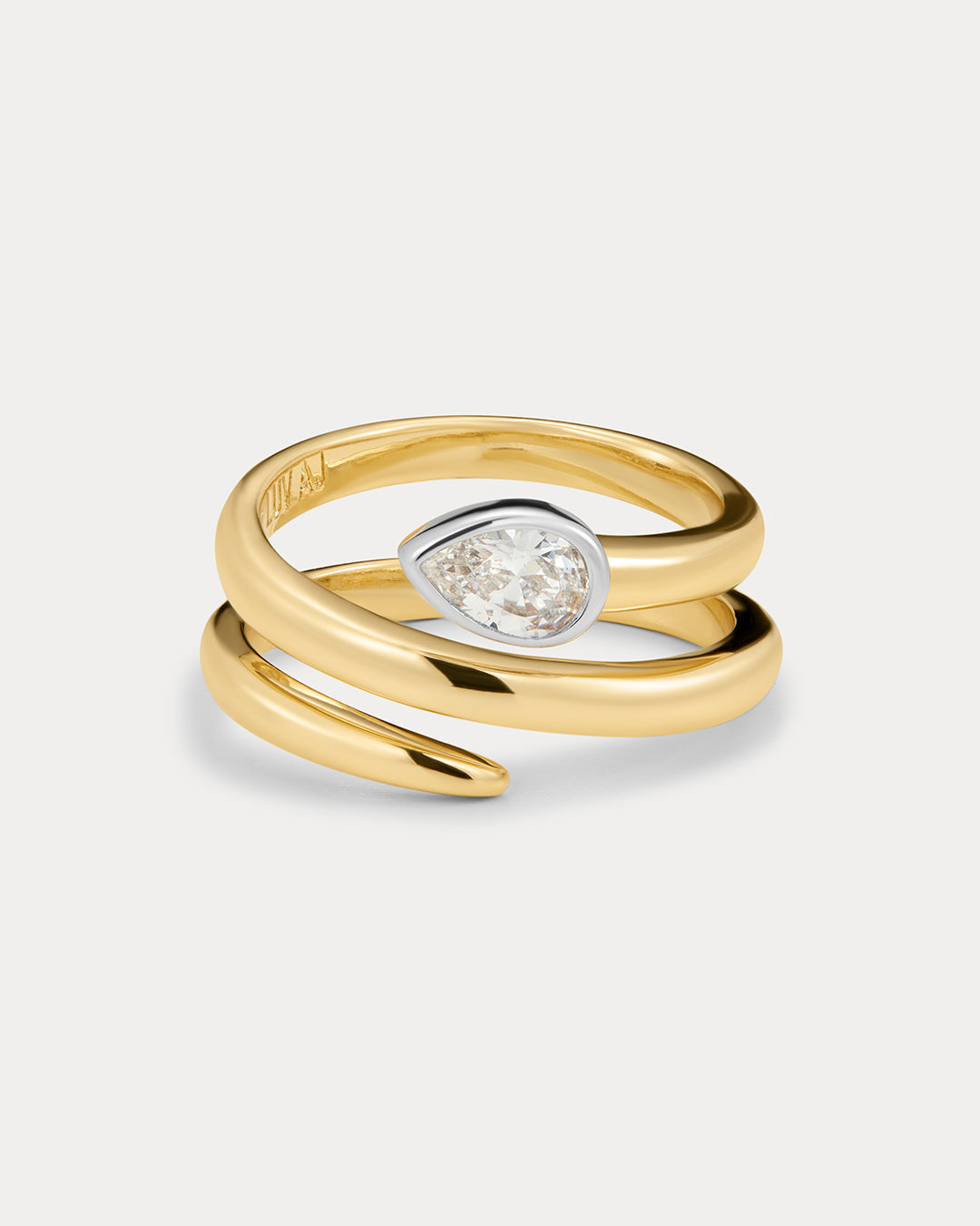 The Luv Aj Marais Coil Ring in Gold on white background