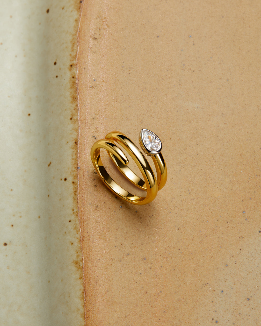 The Luv Aj Marais Coil Ring flay lay photo in Gold