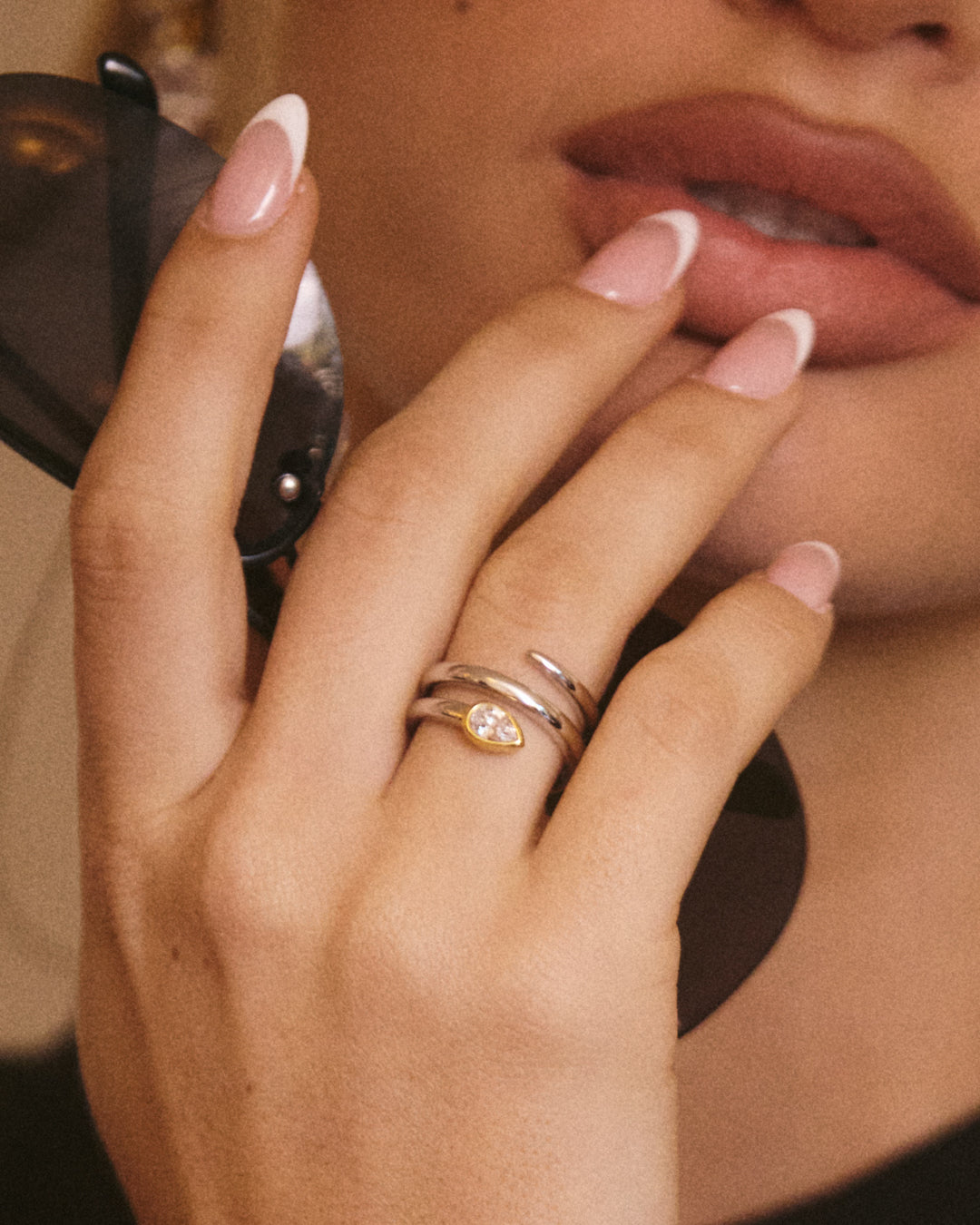 The Luv Aj Marais Coil Ring in Silver on Model's ring finger