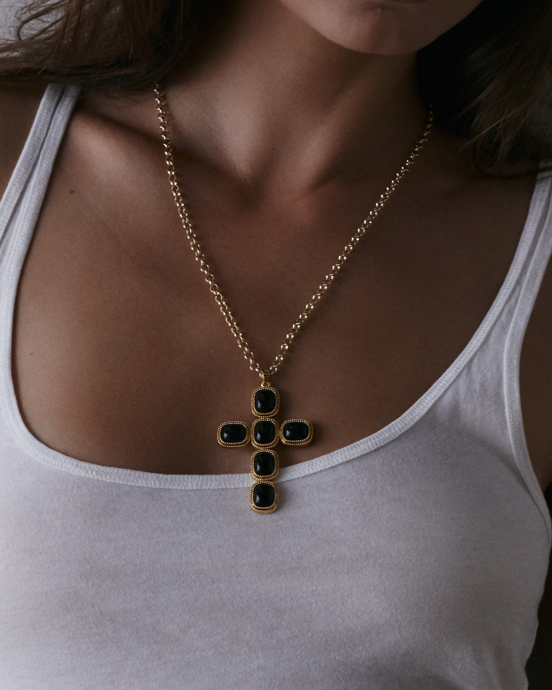 The Luv Aj Midnight Mesa Cross Necklace in Gold on Model