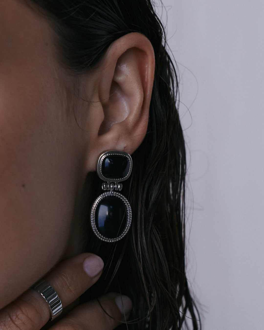 The Luv Aj Midnight Mesa Drop Studs in Silver on Model