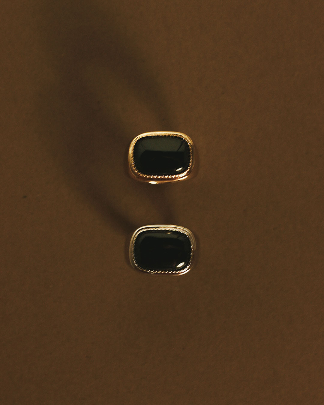 The Luv Aj Midnight Mesa Gold and Silver Ring in flat lay photo