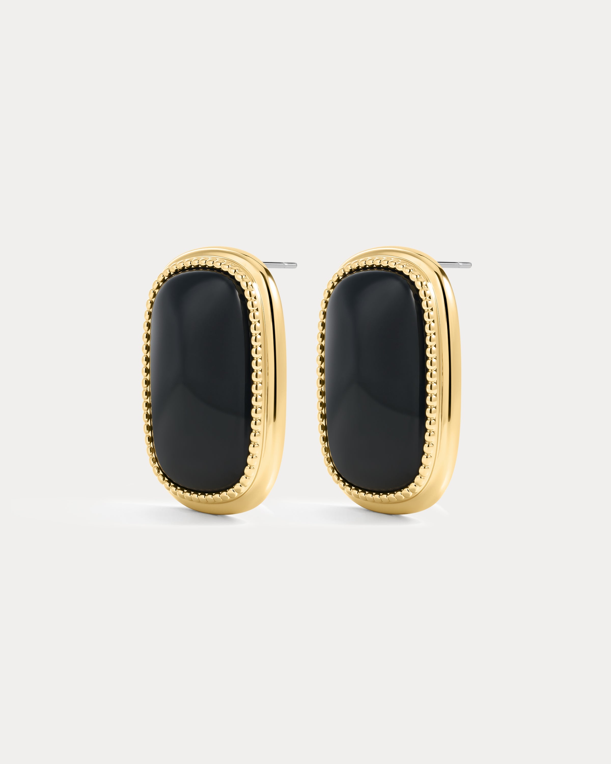 The Luv Aj Midnight Mesa Statement Studs in Gold on White Background