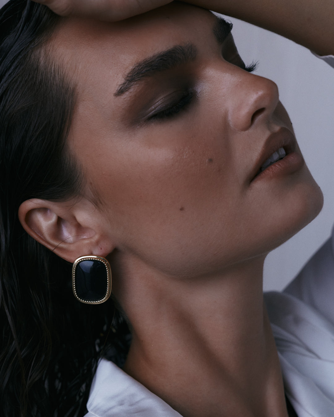 The Luv Aj Midnight Mesa Statement Studs in Silver on model