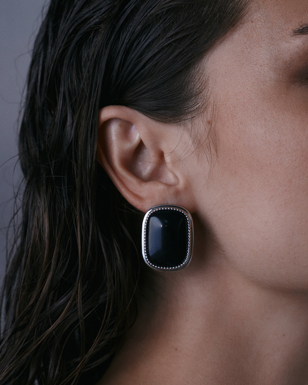 The Luv Aj Midnight Mesa Statement Studs in Silver on Model