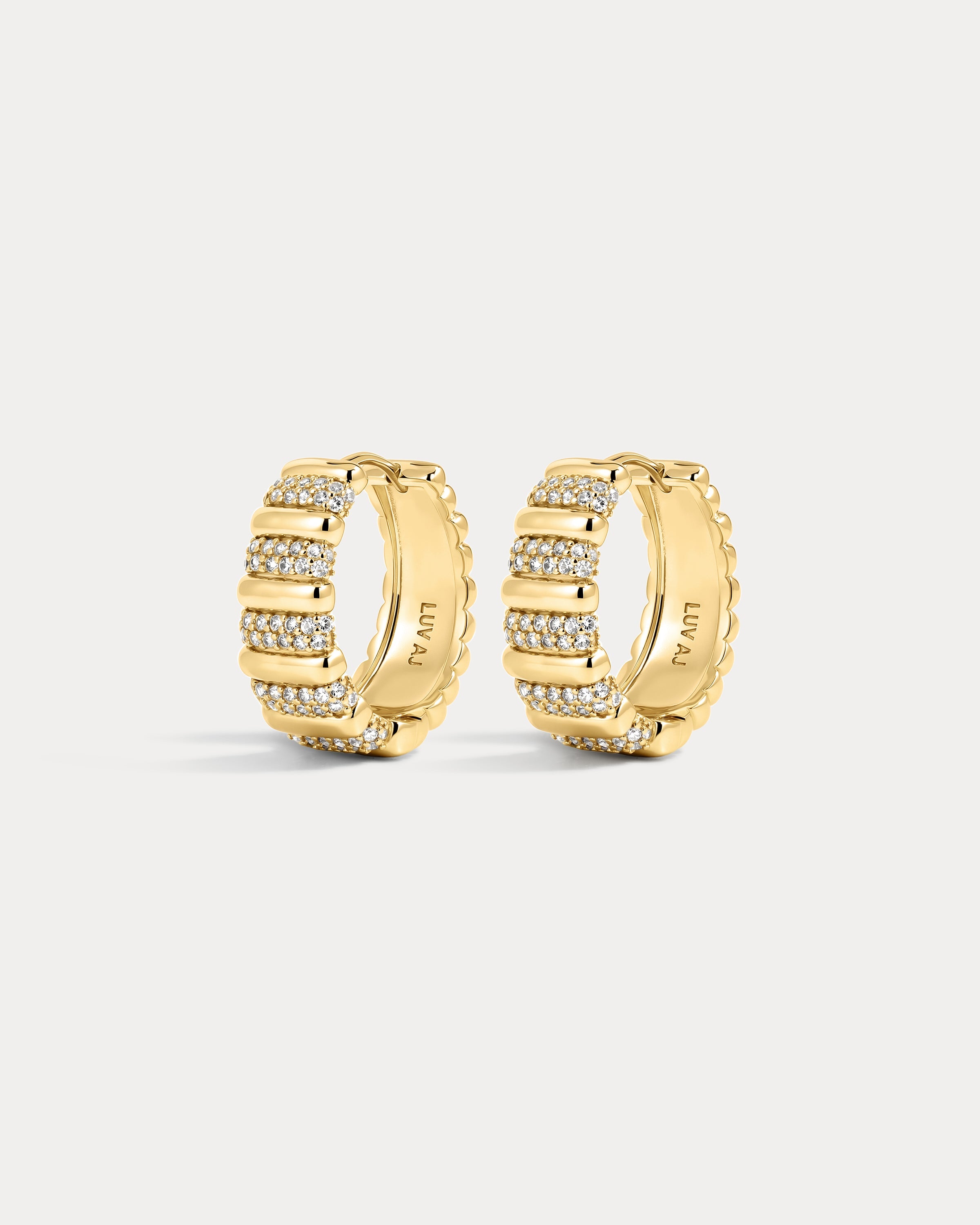 The Luv Aj Pave Marbella Ridged Hoops in Gold on white background
