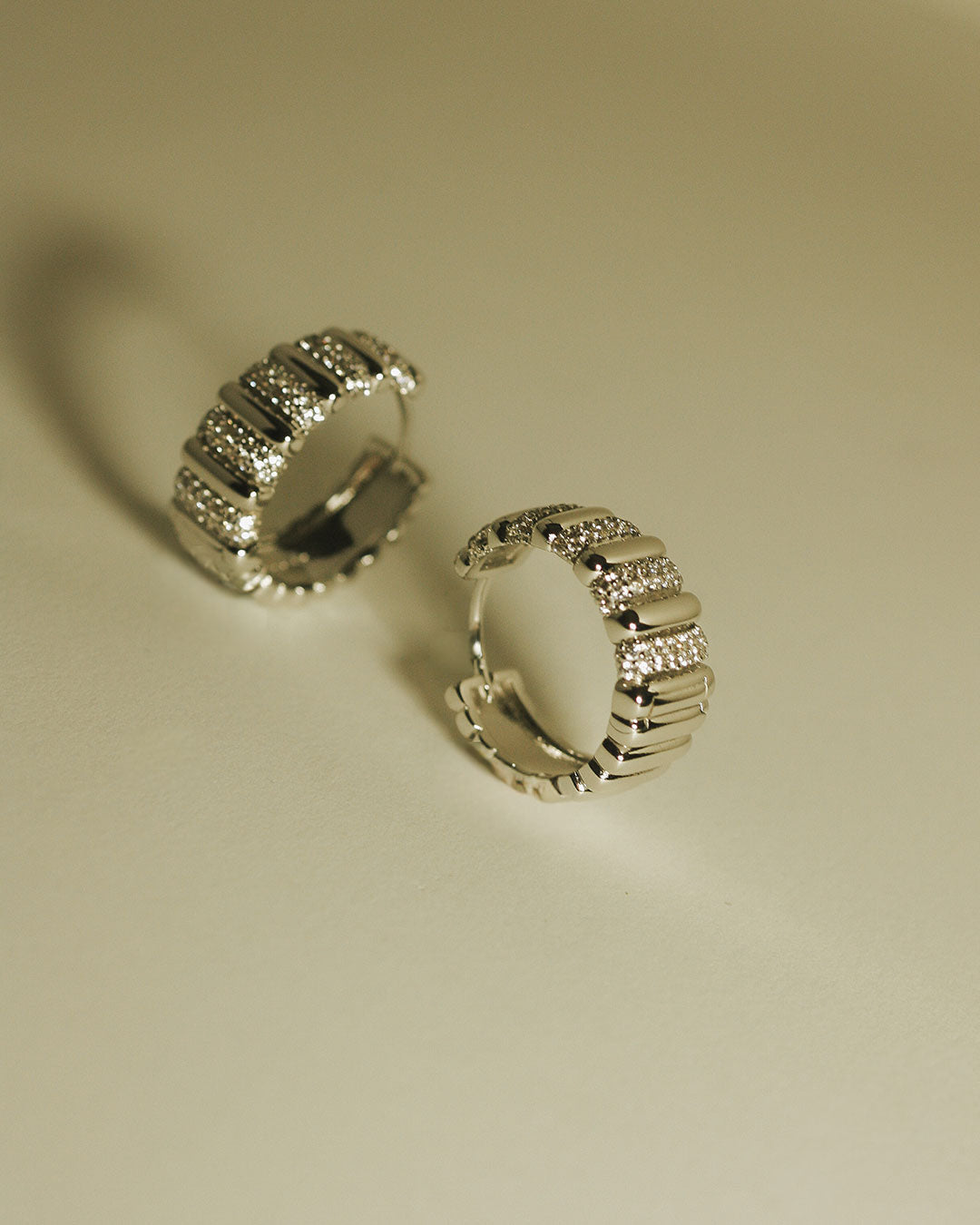 The Luv Aj Pave Marbella Ridged Hoops in Silver
