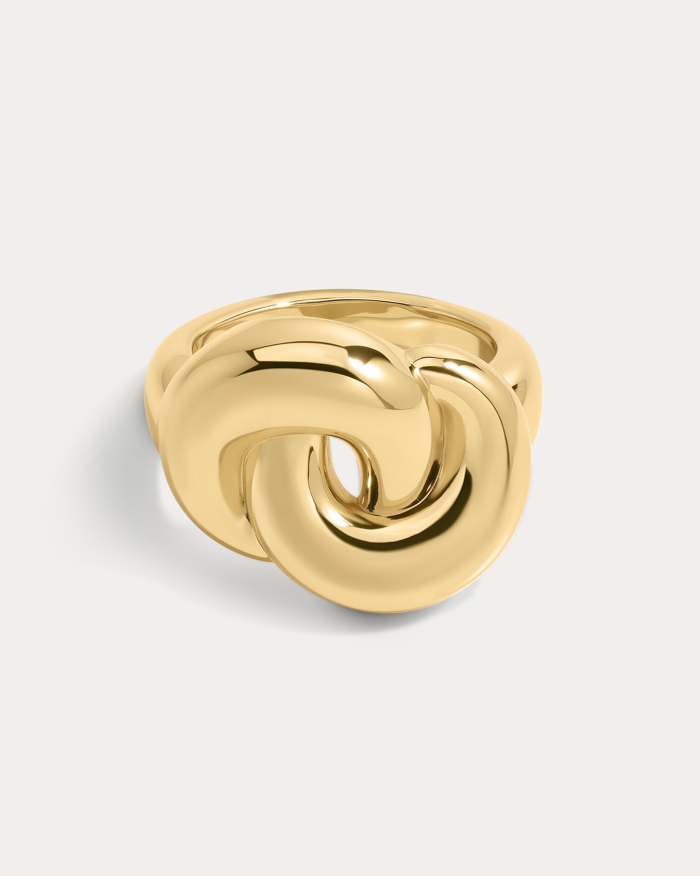 The Luv Aj Solstice Knot Ring in Gold on white background