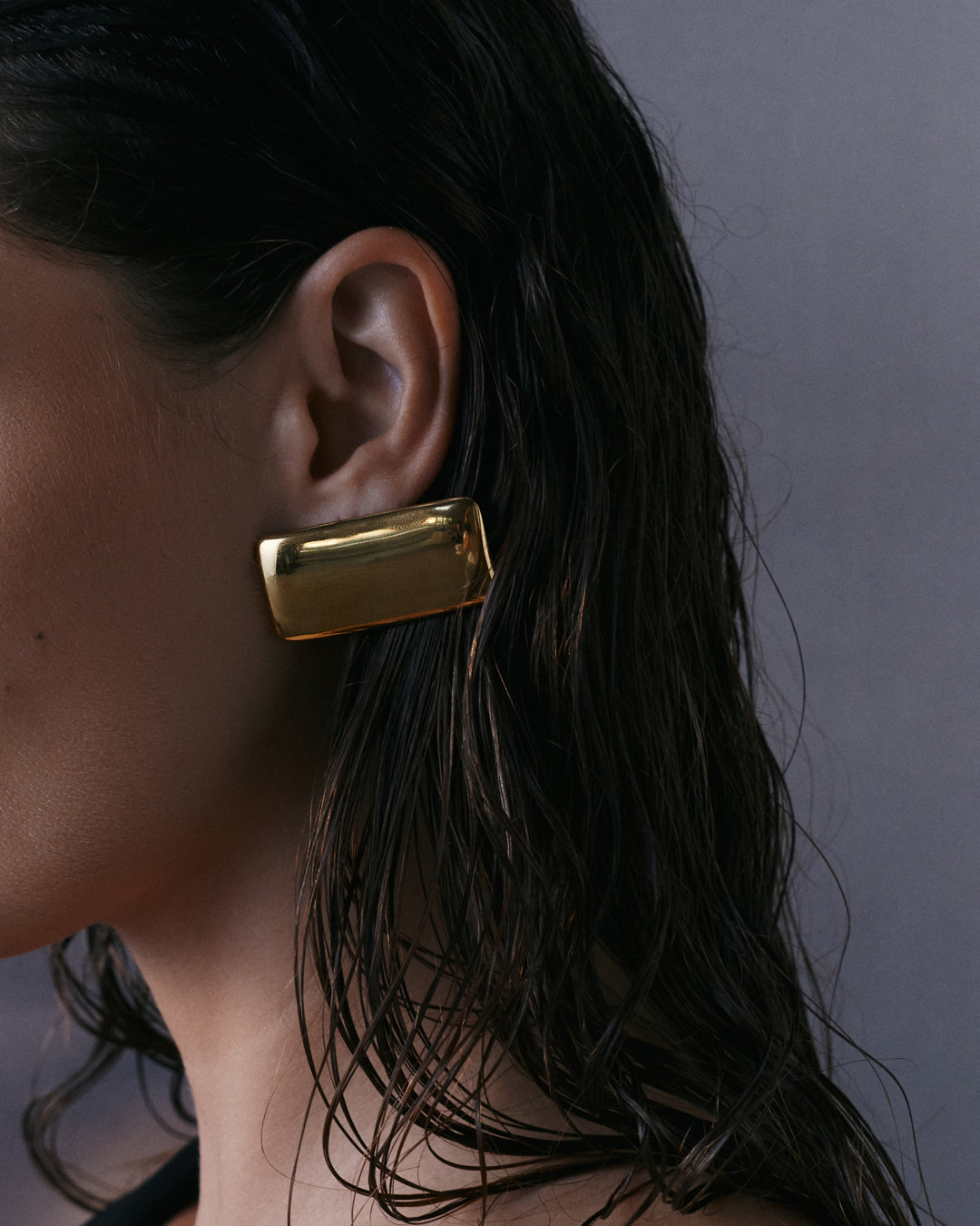 The Luv Aj Solstice Metal Studs in Gold on model