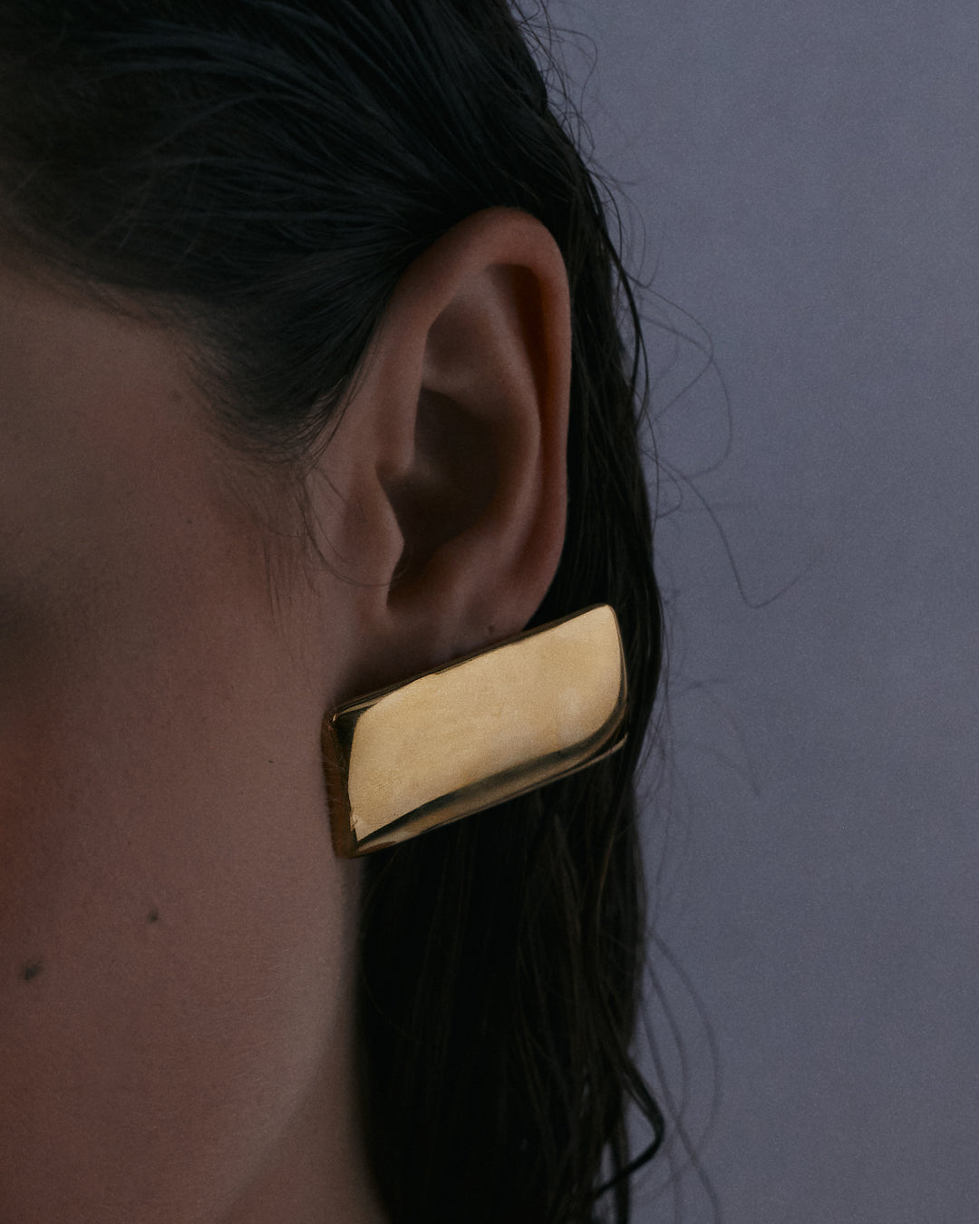 The Luv Aj Solstice Metal Studs in Gold on Model