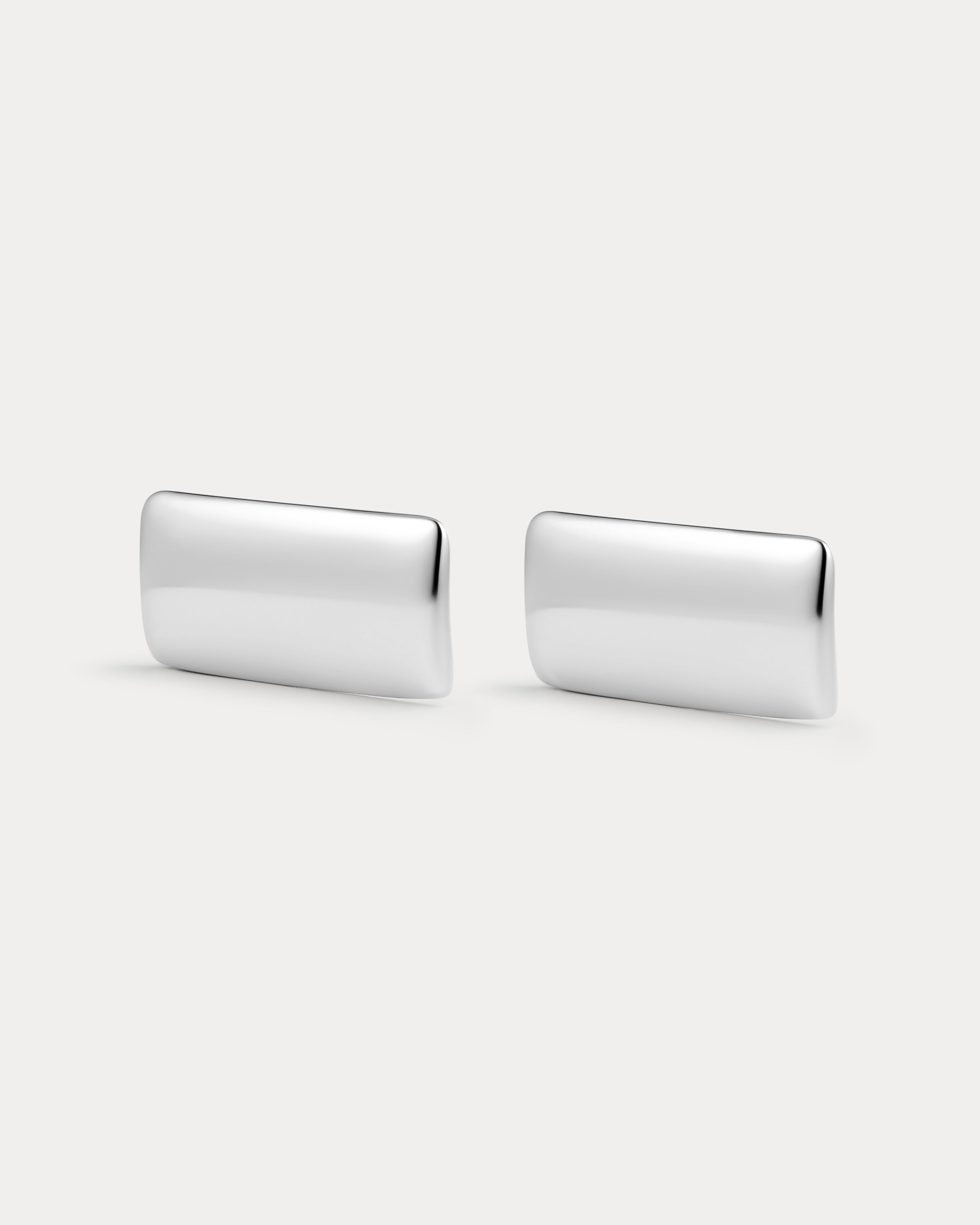 The Luv Aj Solstice Metal Studs in Silver on White Background