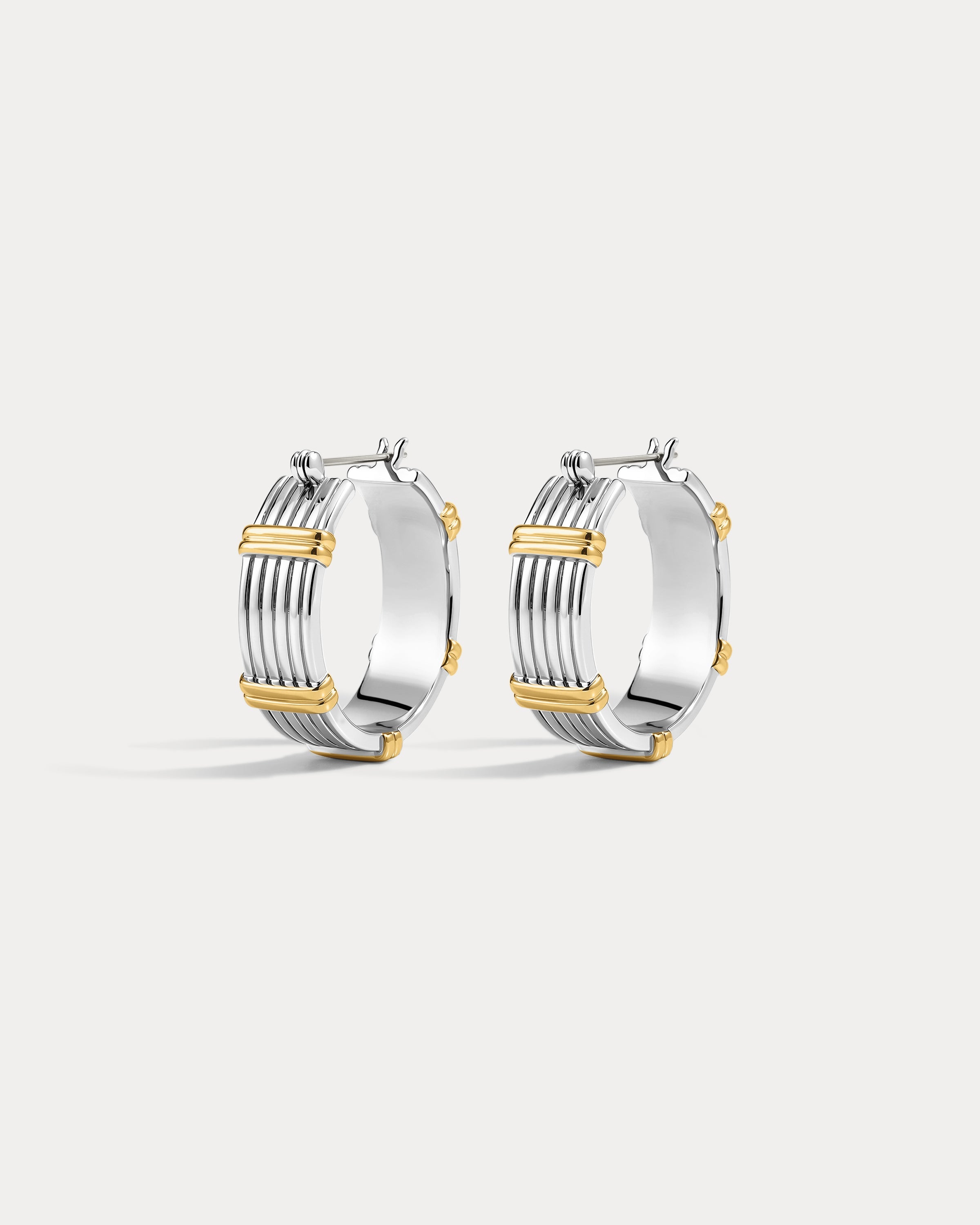 The Luv Aj Two Tone Sierra Bar Hoops in silver on a white background