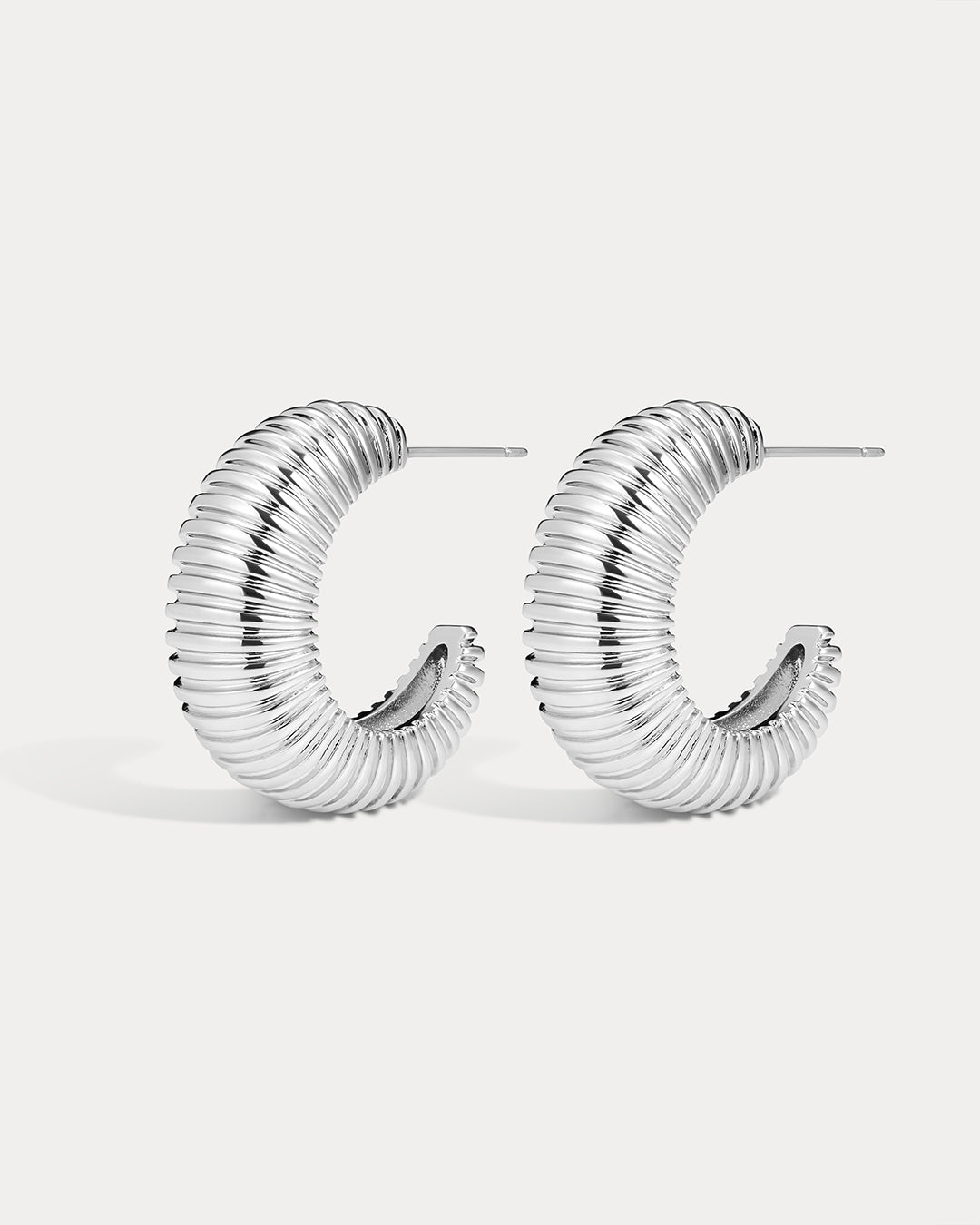 The Luv Aj XL Georgia Ridged Hoops in Silver on white background