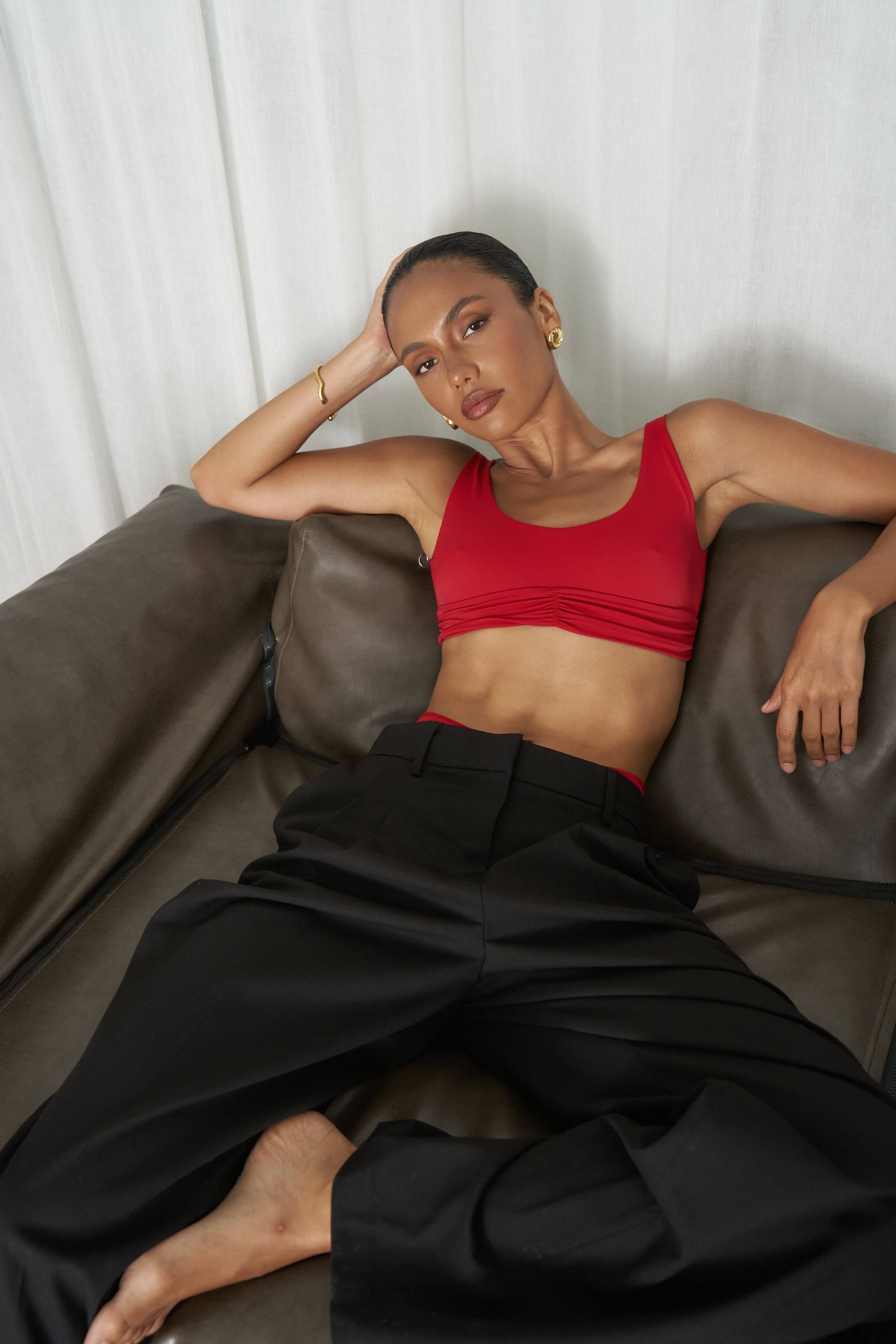 RIOT SWIM Pico Top in Fire Red, a stylish sleeveless swim top with a vibrant, eye-catching color and sleek design.