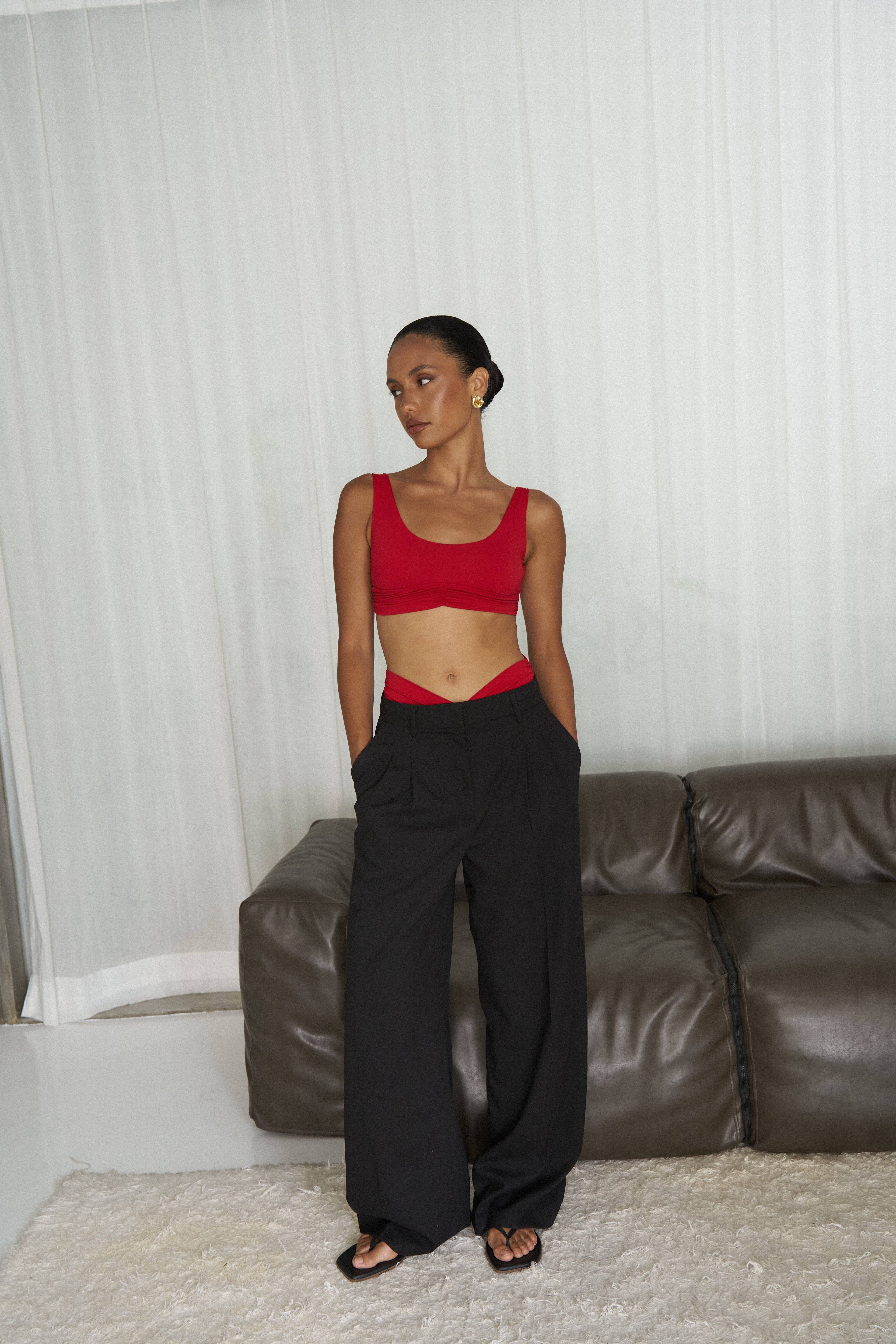 RIOT SWIM Pico Top in fire red, a stylish sleeveless crop top with a fitted design, displayed on a plain background.