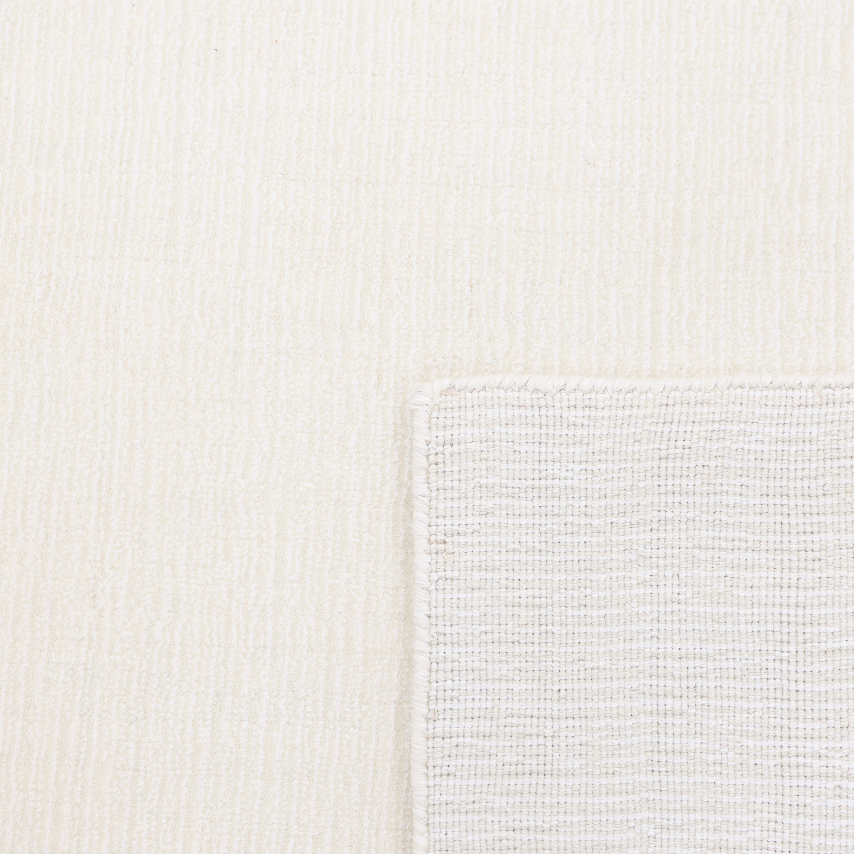 Lodhi Hand-Loomed Contemporary Solid Ivory Area Rug