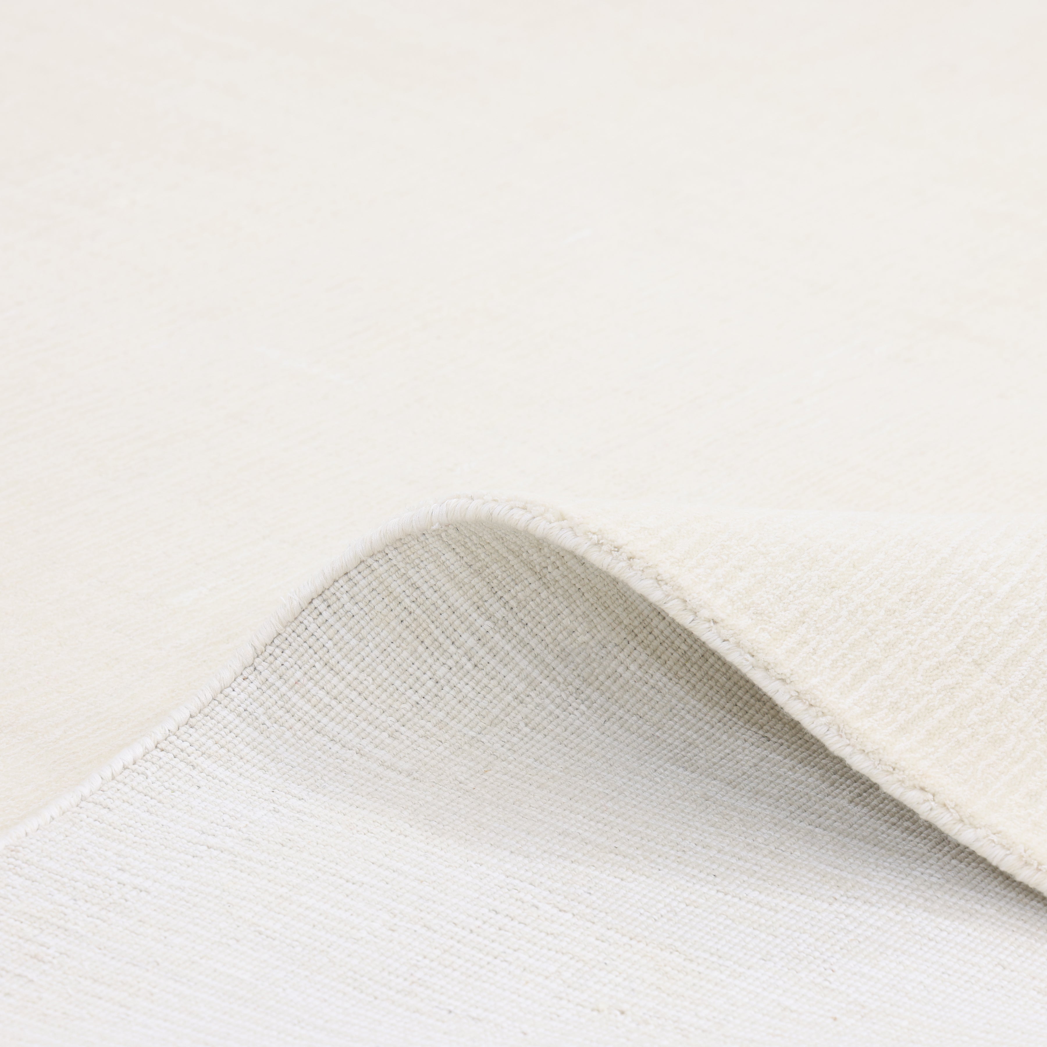 Lodhi Hand-Loomed Contemporary Solid Ivory Area Rug