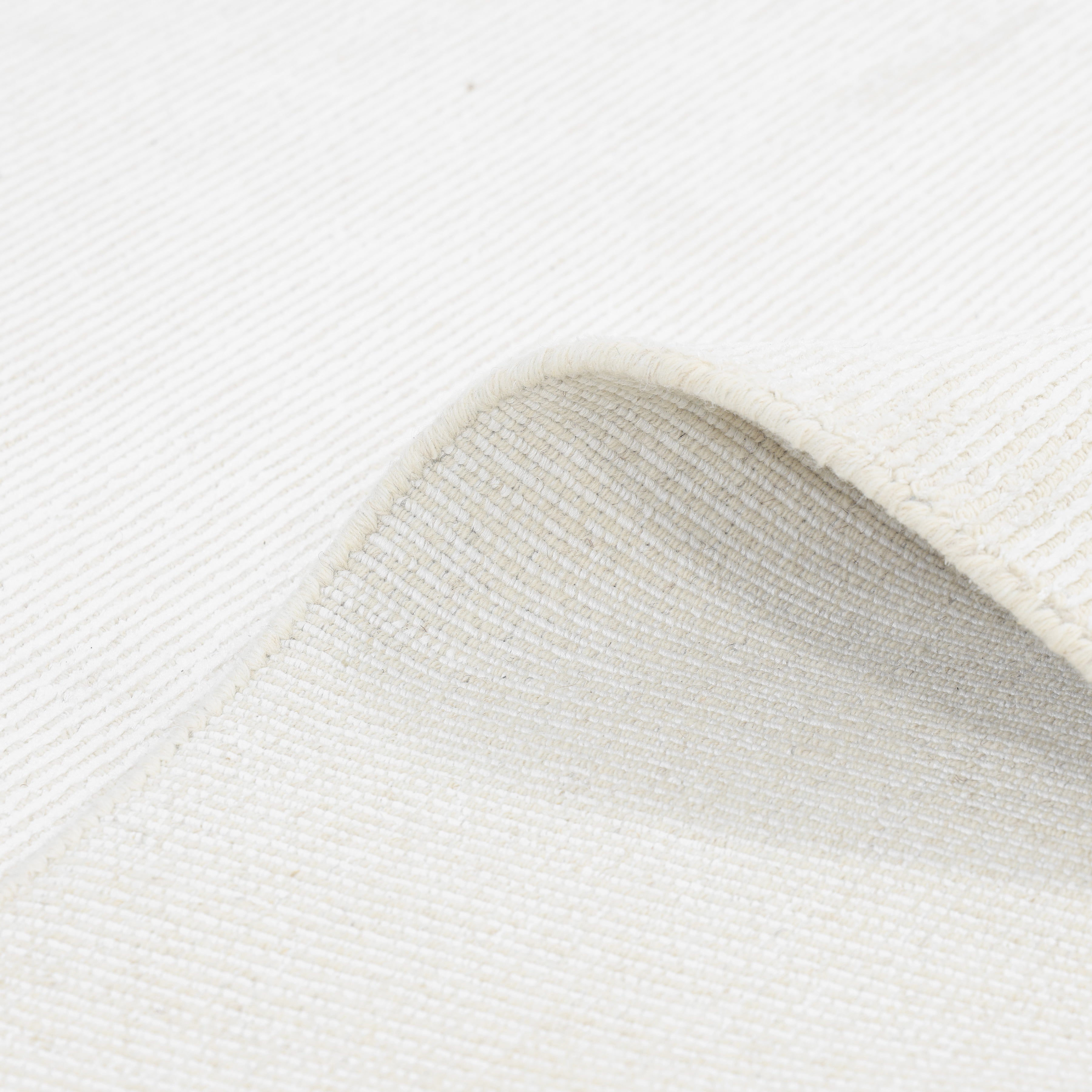 Cordi Hand-Loomed Contemporary Solid Ivory Area Rug