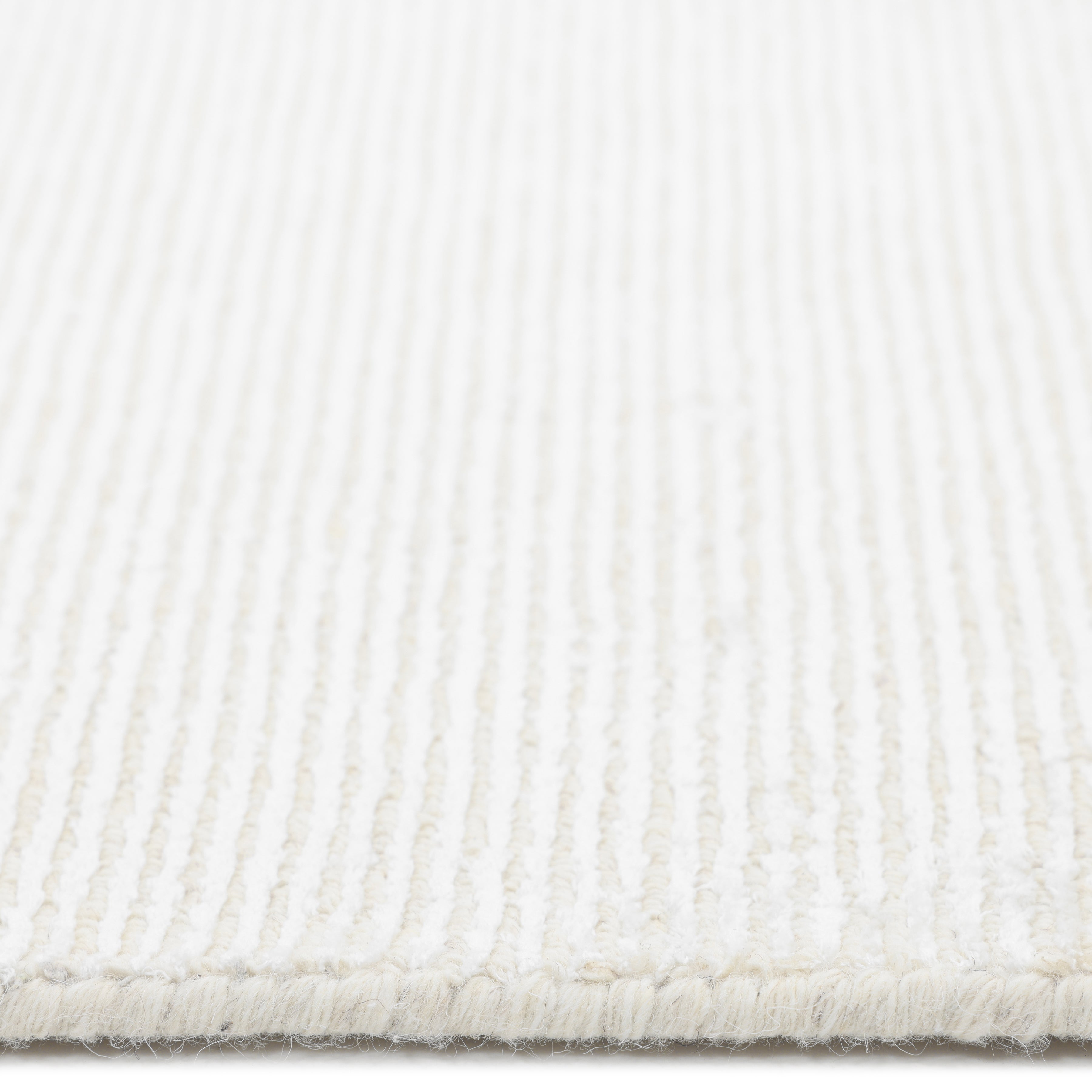 Cordi Hand-Loomed Contemporary Solid Ivory Area Rug