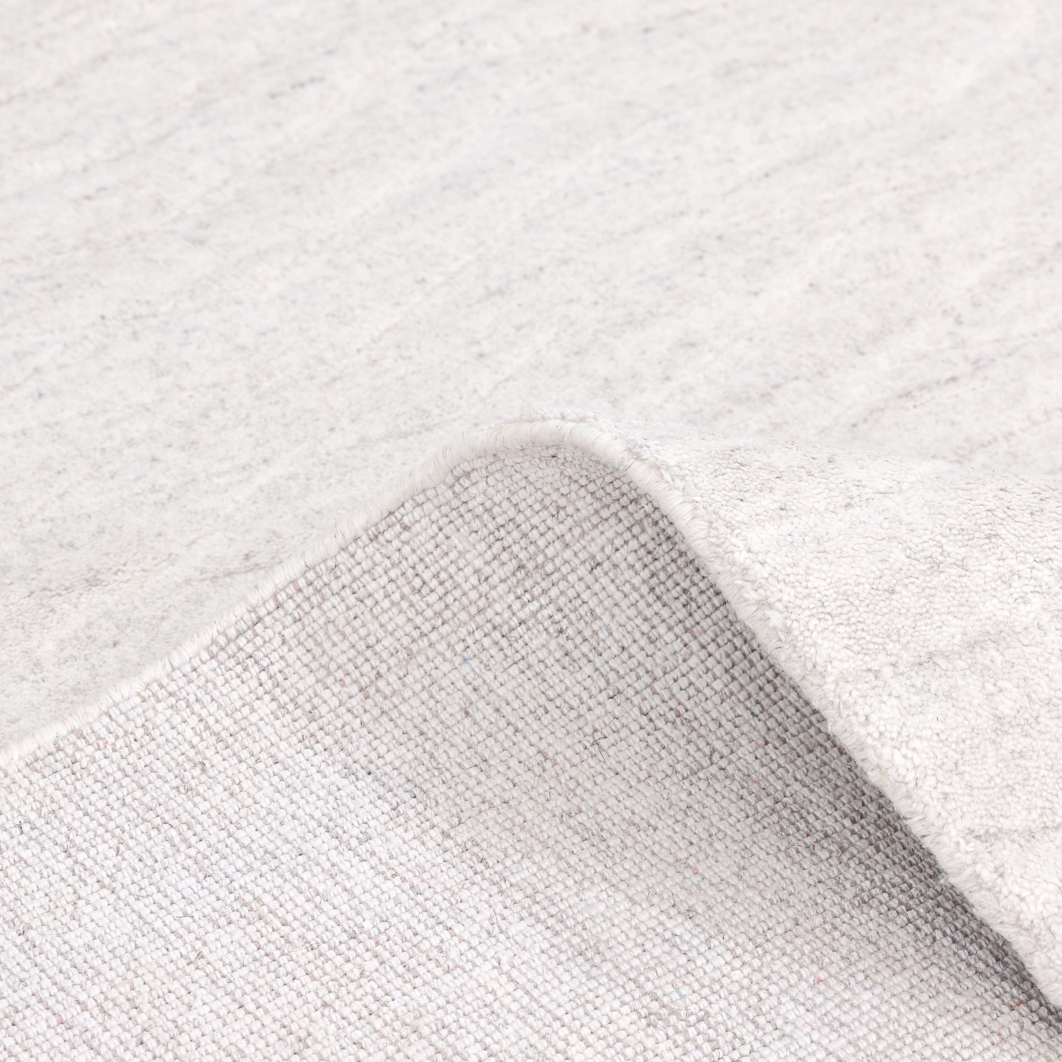 Rishab Hand Knotted Contemporary Solid Ivory Area Rug