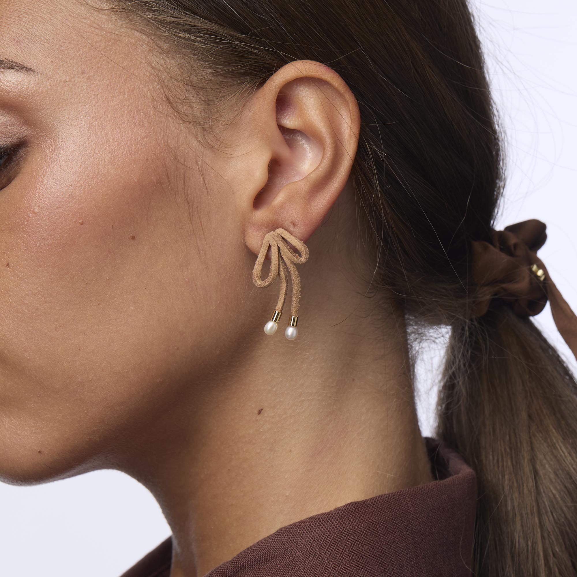 Lele Sadoughi EARRINGS CARAMEL FAUX SUEDE BOW EARRINGS