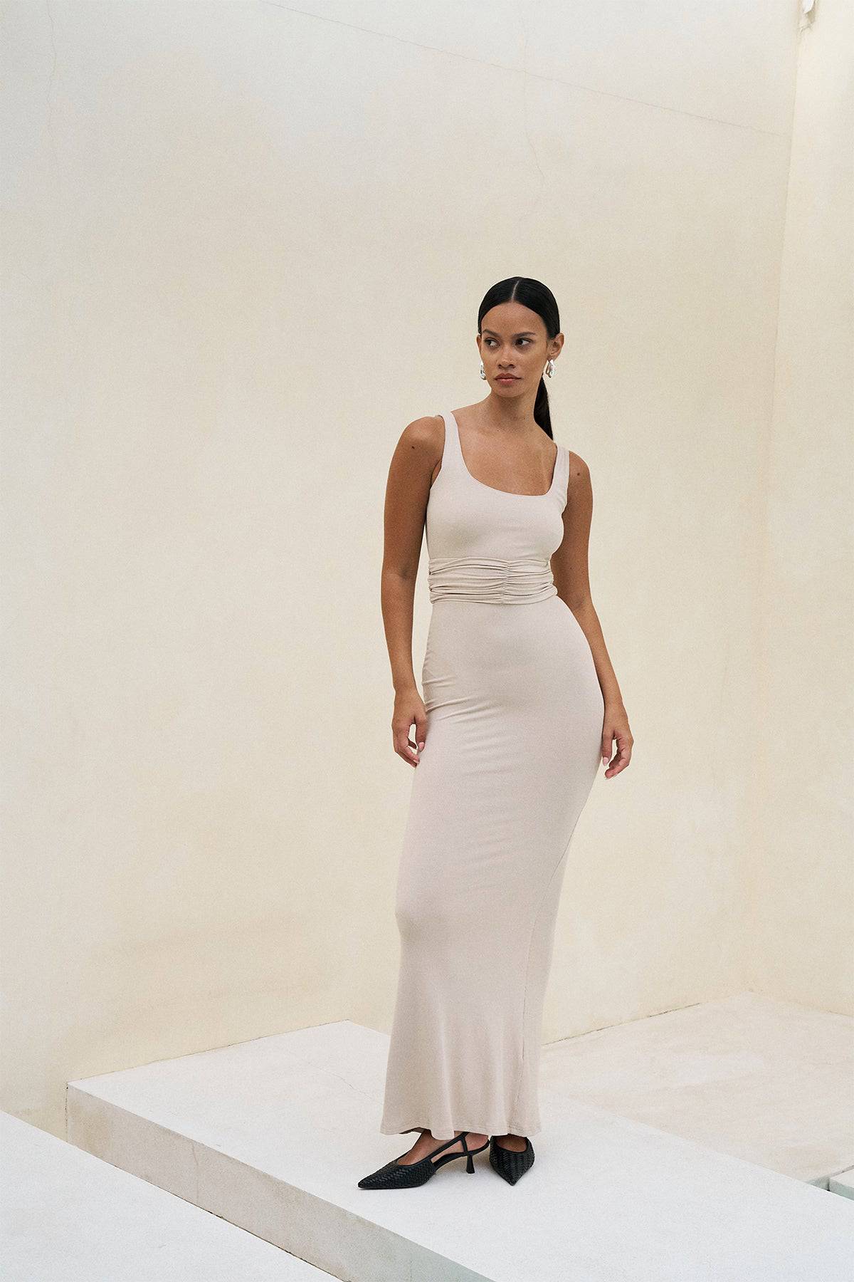 Riot Lounge Roxi Maxi Dress in soft ribbed coconut color, flowing dress with a relaxed fit and elegant design.