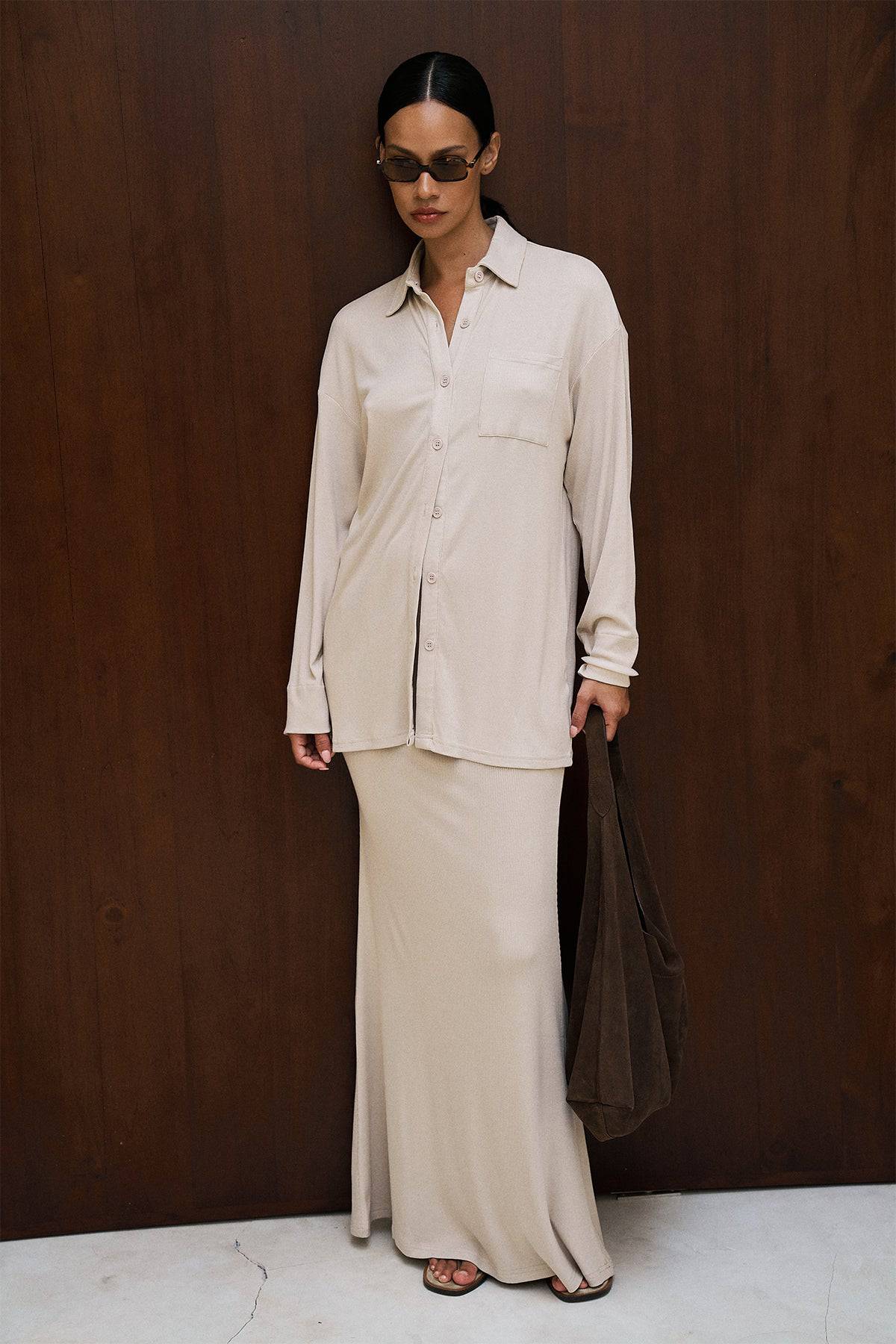 Riot Lounge Camden Button Down coconut-colored soft-ribbed apparel top displayed on hanger.