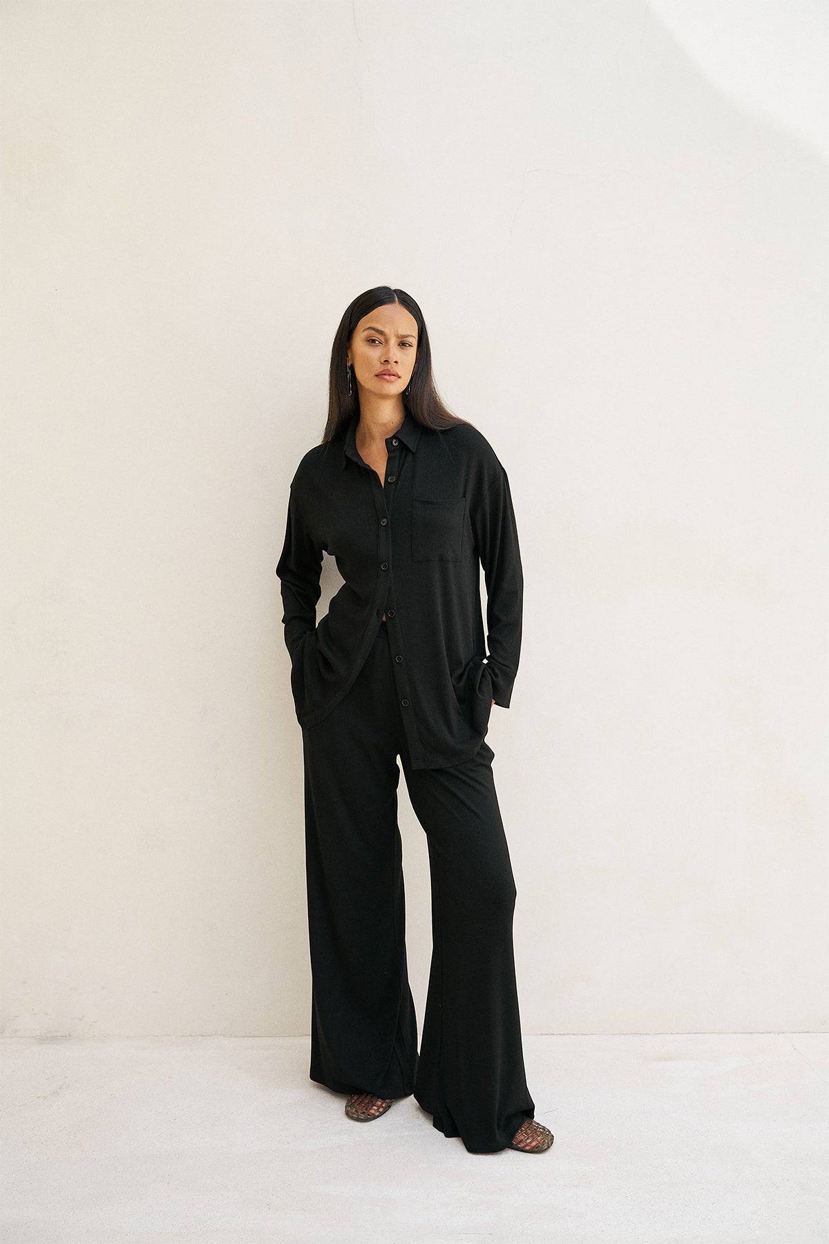 Black Riot Lounge Camden Button Down shirt with soft ribbed fabric, stylish casual apparel top for comfortable everyday wear.