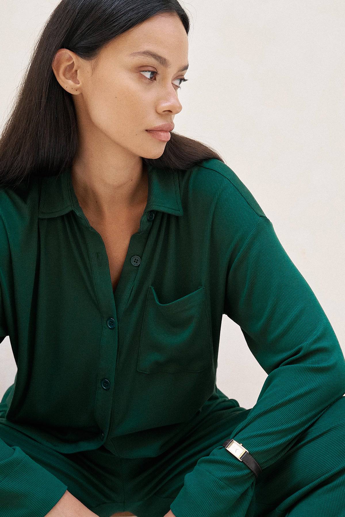 Forest green Camden button-down top by Riot Lounge, featuring soft ribbed fabric and classic collar detail.
