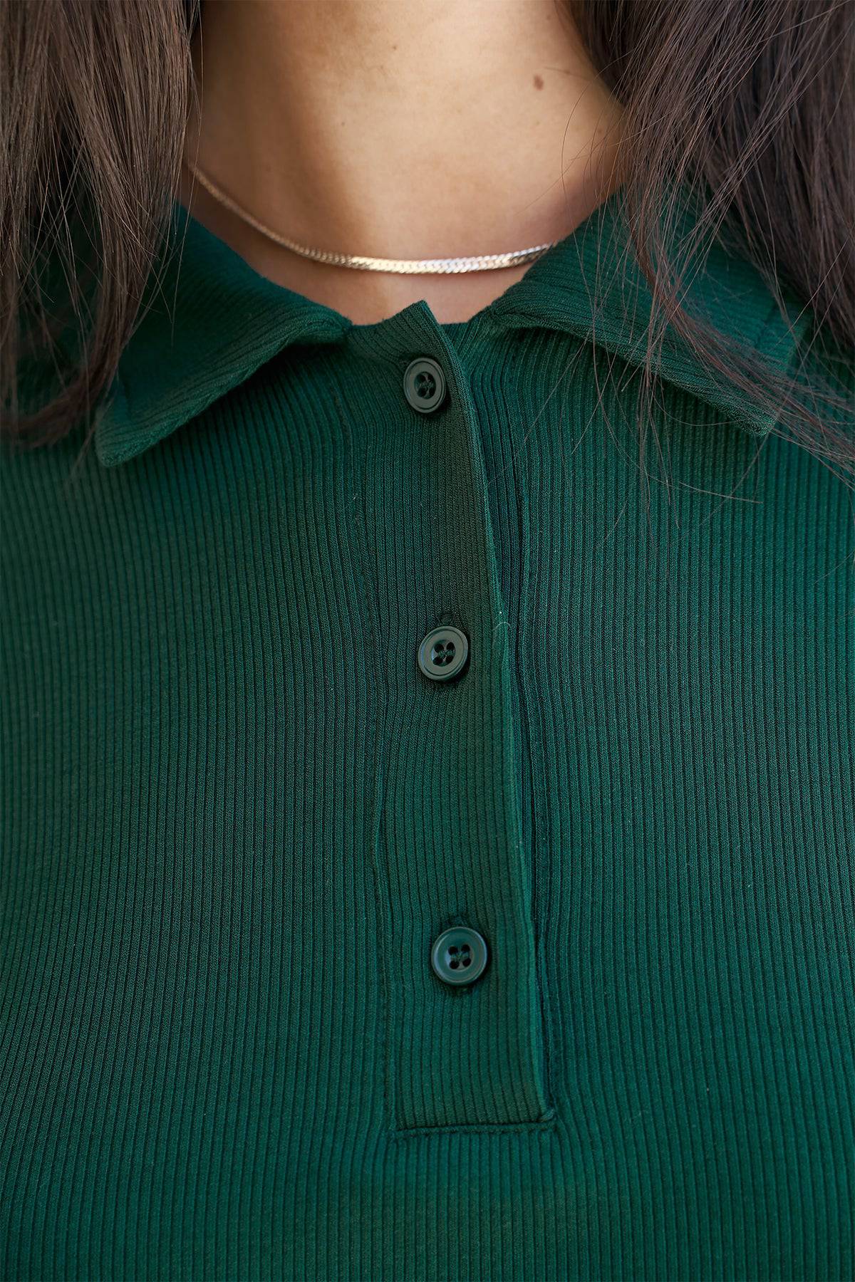 Riot Lounge Rory Oversized Crop top in forest green with soft ribbed fabric, casual style, and relaxed fit.